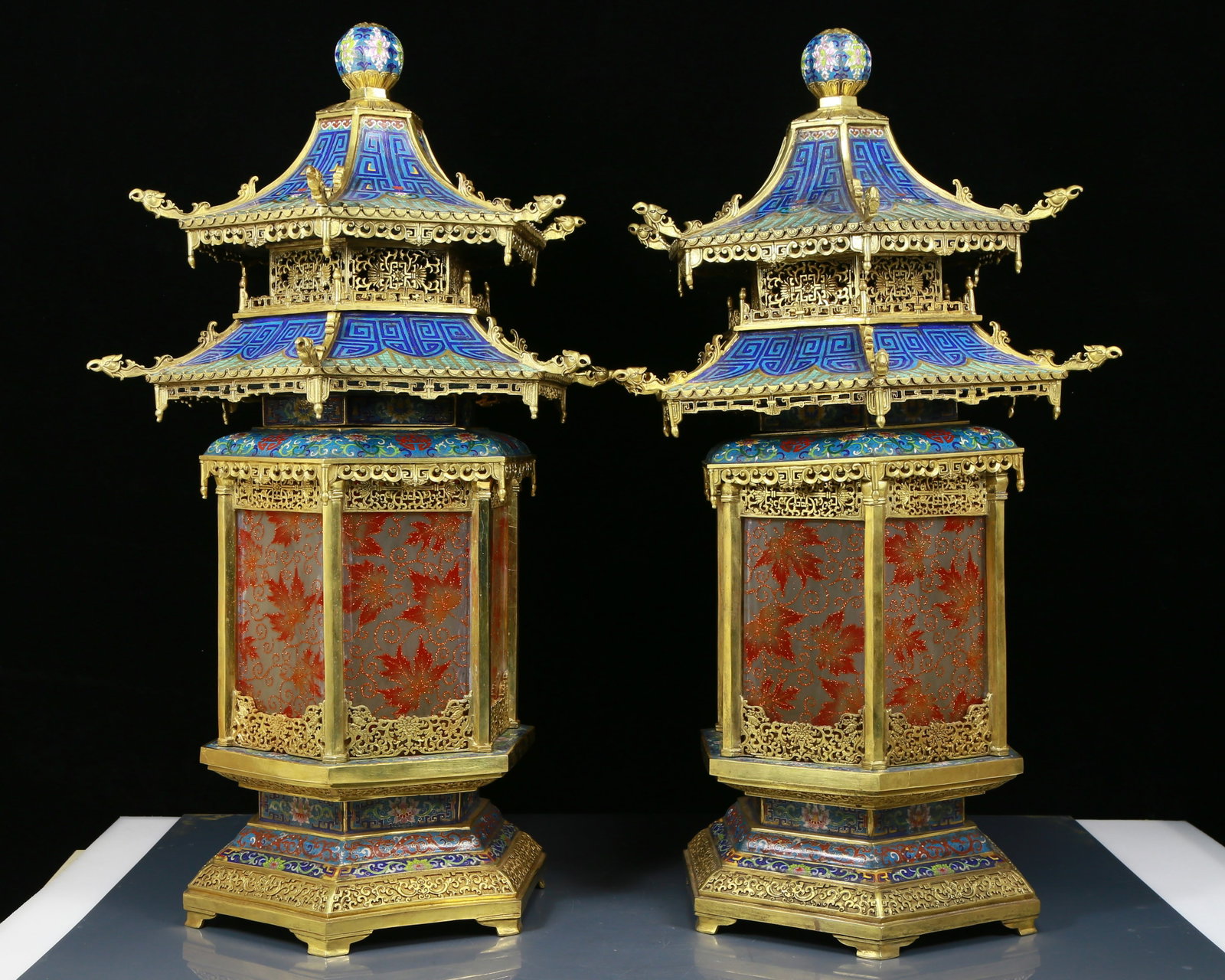 A perfect pair of cloisonne lotus pattern palace lanterns: A pair of perfect cloisonné palace lanterns with lotus pattern, from the Qing Dynasty in China. Each palace lantern is carefully crafted and covered with magnificent cloisonné craftsmanship,