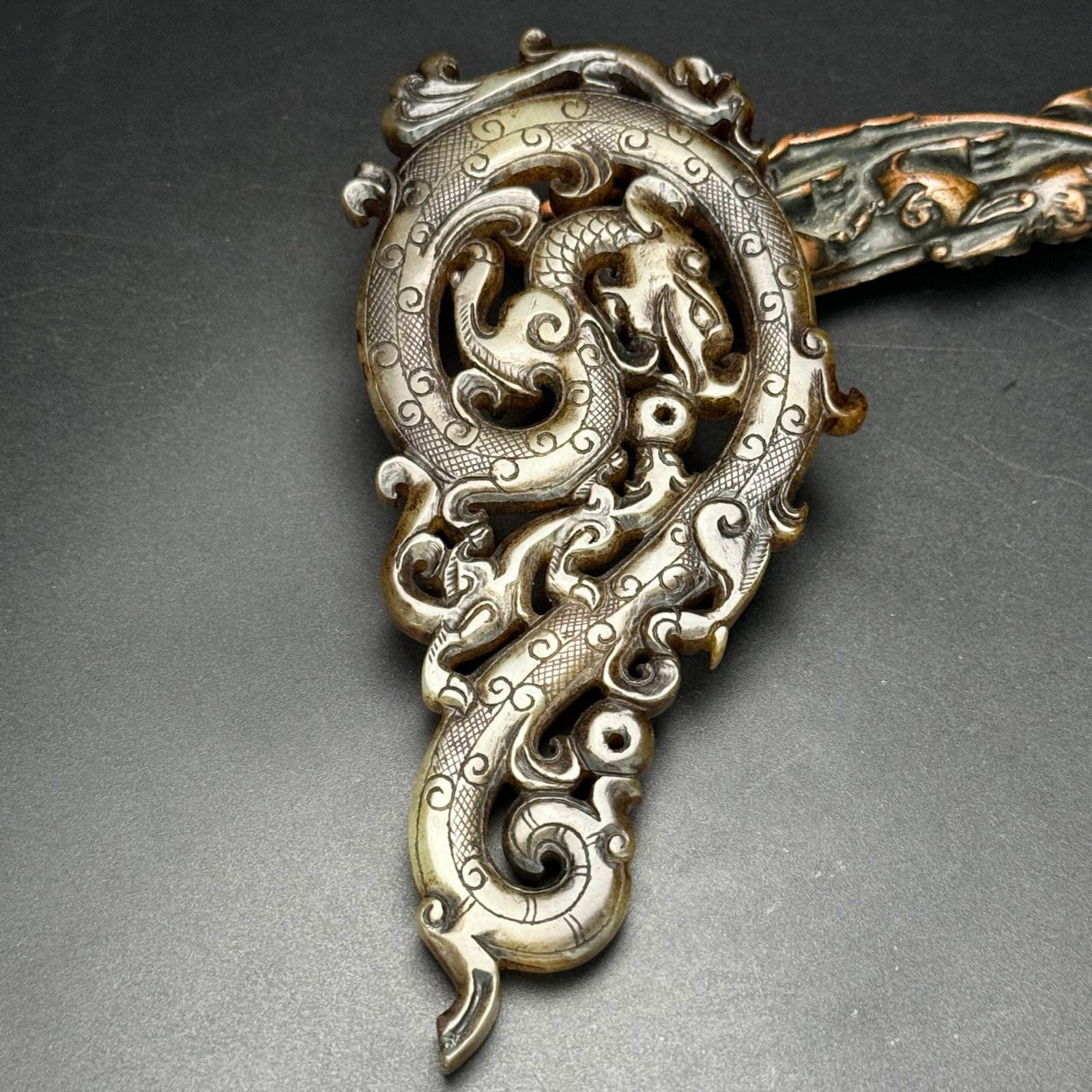 An Exquisite Archaic Jade Dragon Pendant: An Exquisite Archaic Jade Dragon Pendant,Ancient Time,China,Size:143mmx66mmx7mm,Weight:85g 高古玉龙佩,中国远古时期