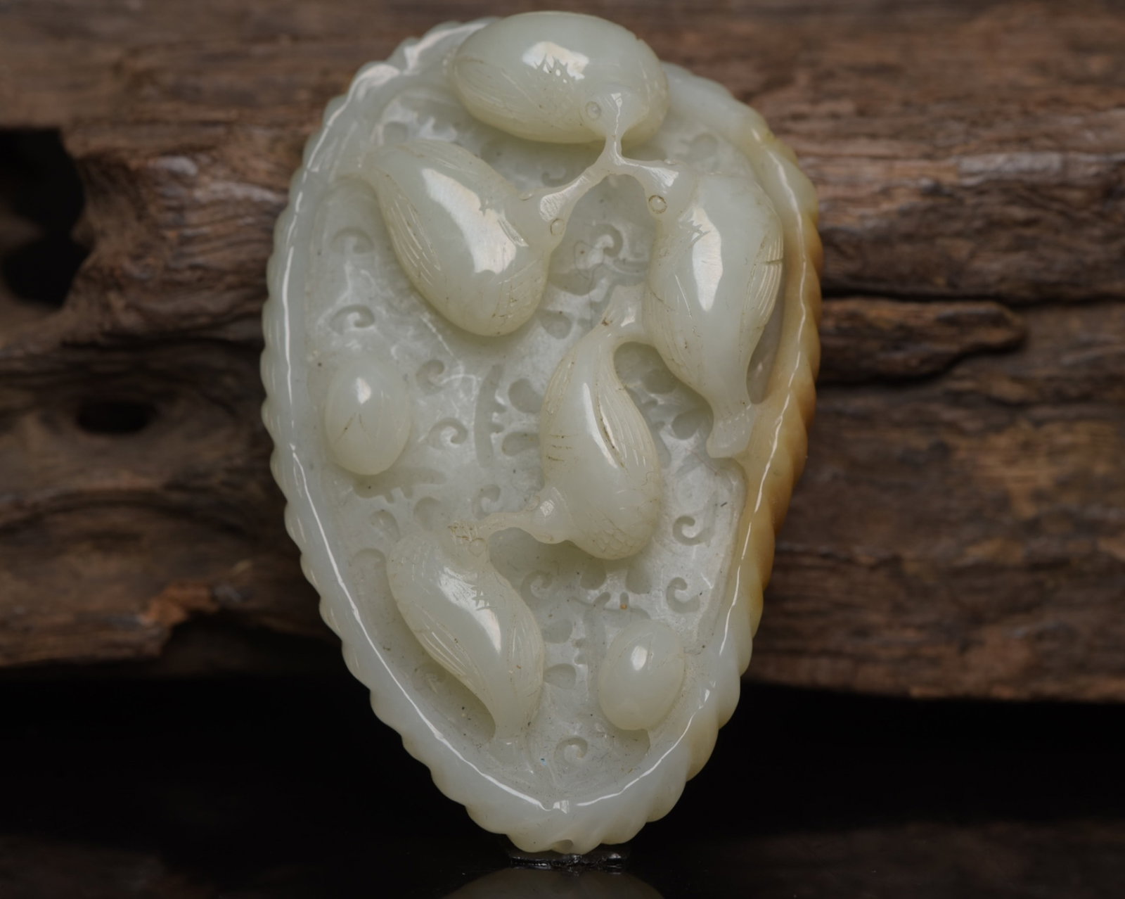 An Exquisite White Jade Flower and Bird Pattern Ornament: An Exquisite White Jade Flower and Bird Pattern Ornament,Qing Dynasty,China,Size:3inx1.9inx0.9in,Weight:88g 白玉花鸟纹摆件,中国清代