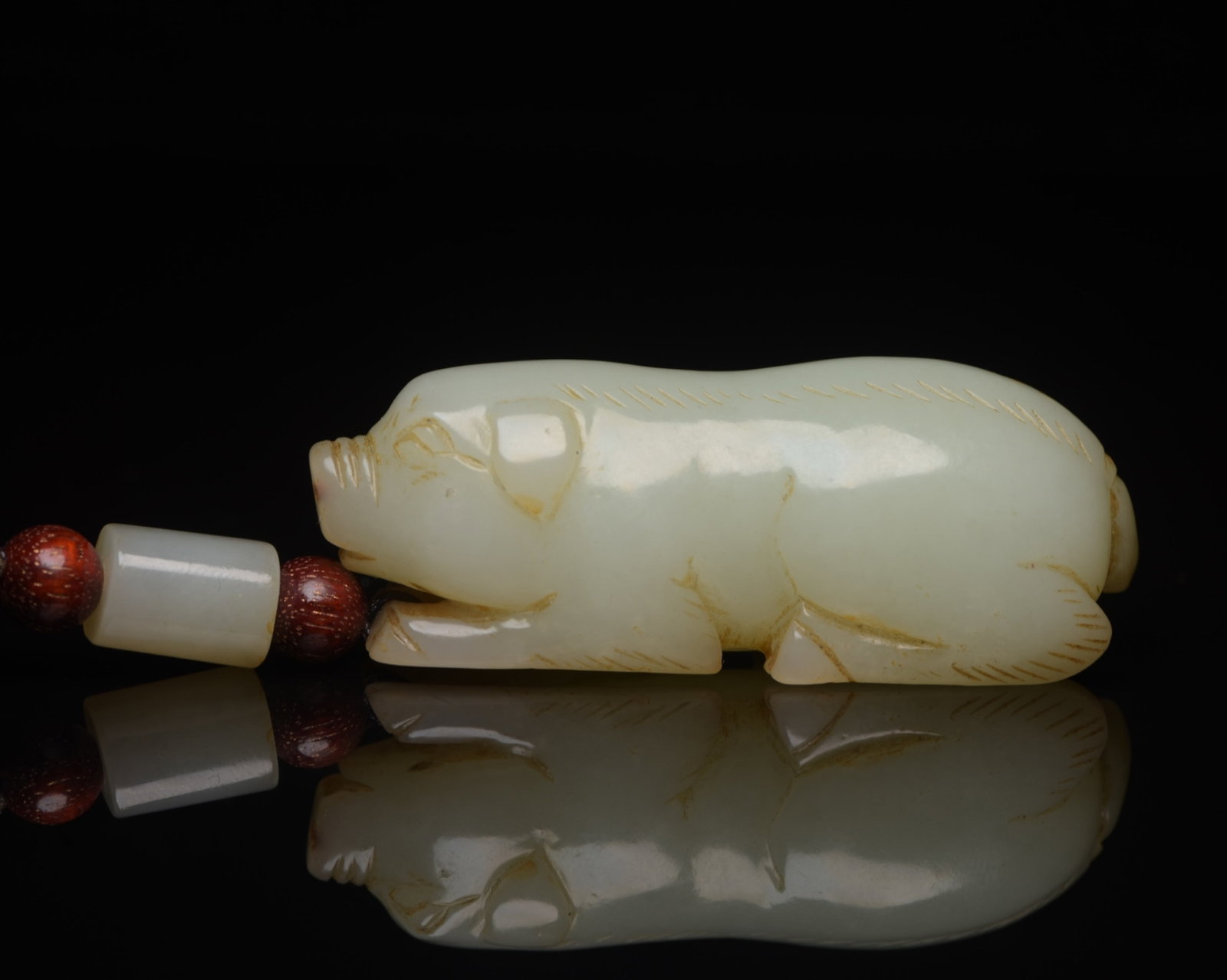 An Exquisite White Jade Pig Pendant: An Exquisite White Jade Pig Pendant,Qing Dynasty,China,Size:2.4inx0.9inx0.9in,Weight:57g 白玉猪挂件,中国清代