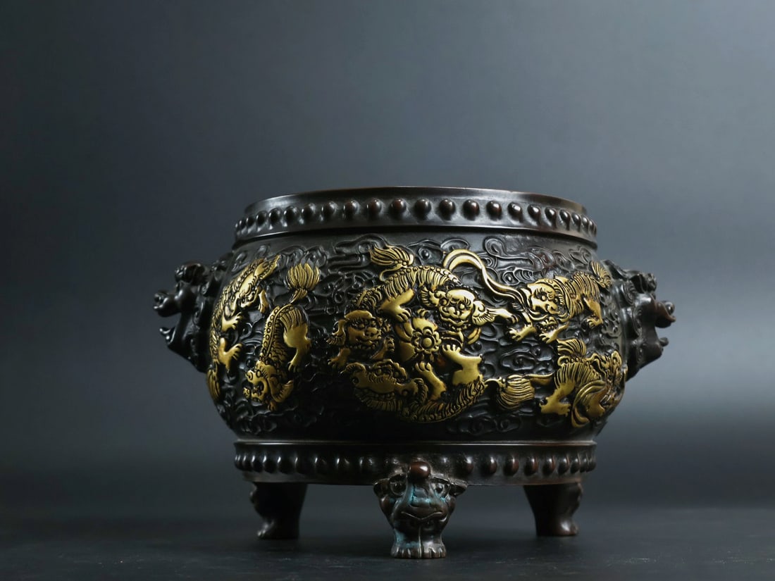 An Exquisite Gilt Bronze Lion Pattern Beast-Ears and Elephant-Legs Censer: An Exquisite Gilt Bronze Lion Pattern Beast-Ears and Elephant-Legs Censer,Ming Dynasty, China, Xuande Six-character Mark,Size:4.6inx5in,Weight:2615g 铜鎏金狮子纹
