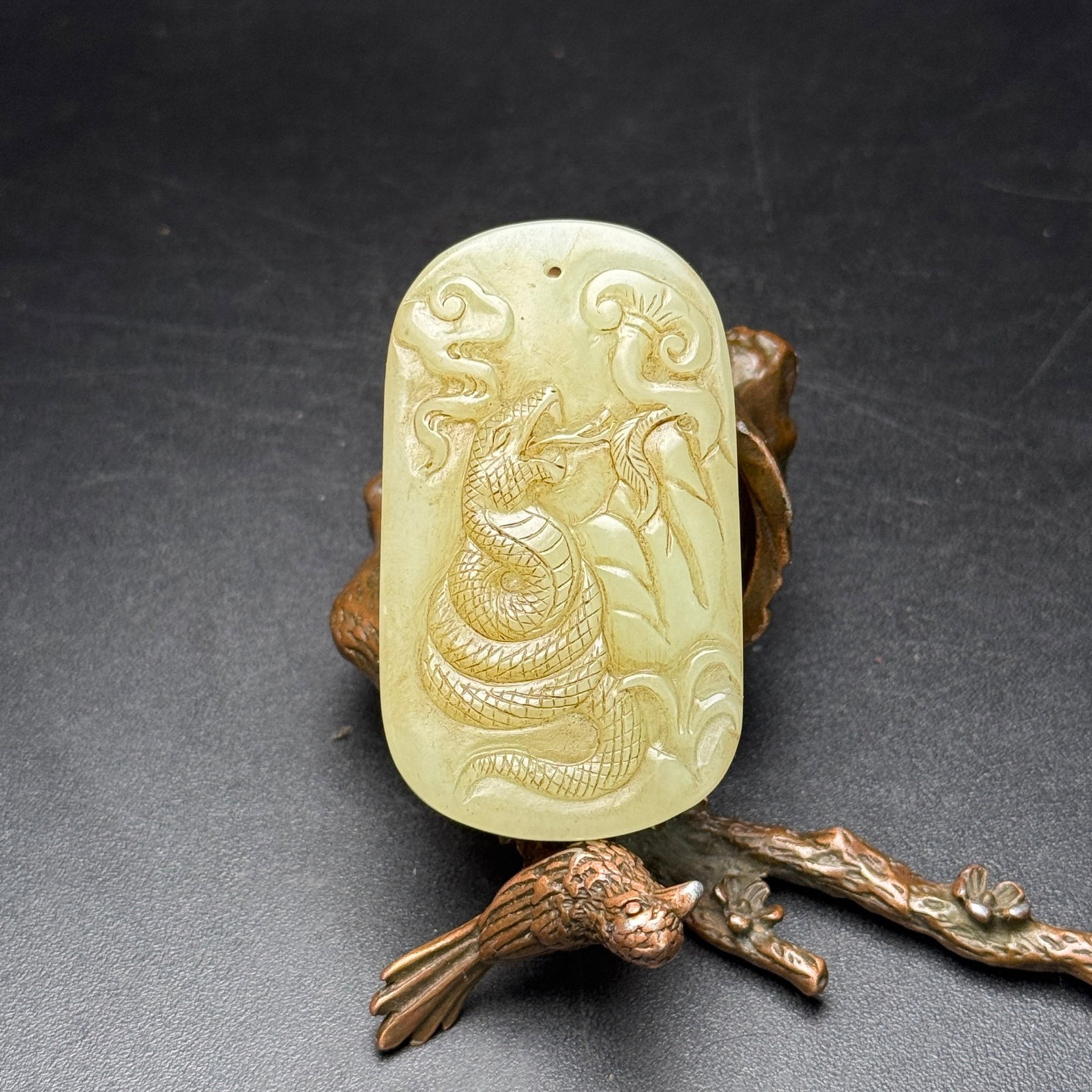 An Exquisite White Jade Snake Patten Pendant: An Exquisite White Jade Snake Patten Pendant,Qing Dynasty,China,Size:59mmx34mmx9mm,Weight:36g 白玉蛇纹挂件,中国清代