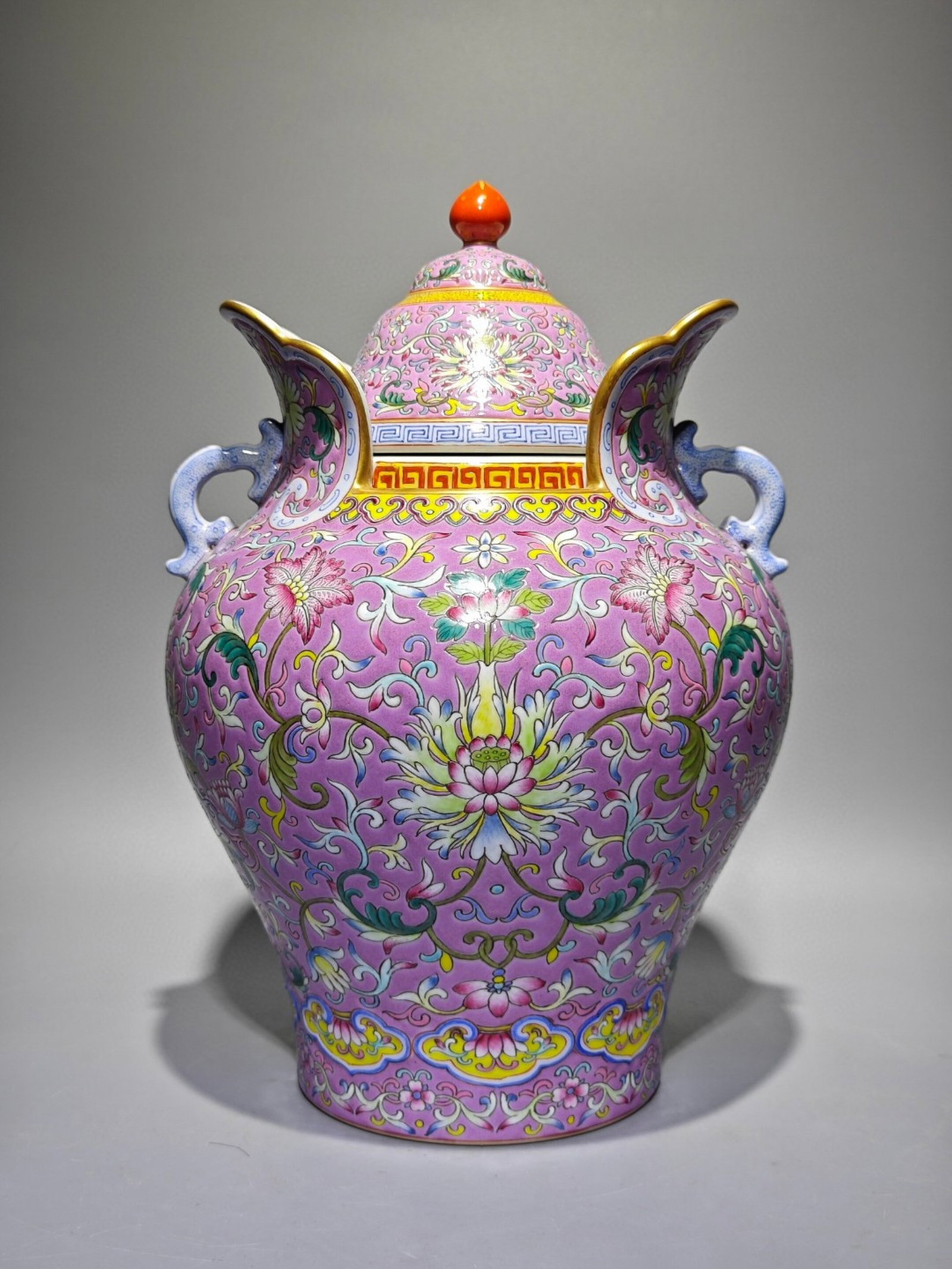 A Rare Purple Groud Enamel Lotus Pattern Double-Ears Jar with Cover: A Rare Purple Groud Enamel Lotus Pattern Double-Ears Jar with Cover,Qing Dynasty,China,Qianlong Six-character Mark,Size:12inx8.3in 紫地珐琅彩缠枝莲ń