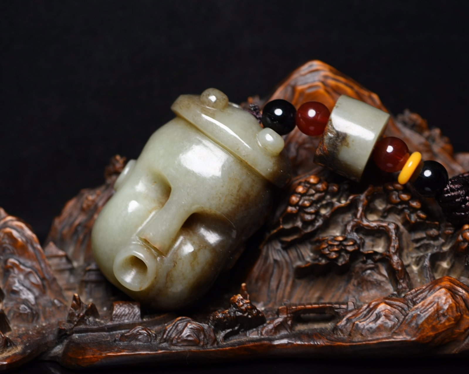 An Exquisite White Jade Figure-Face Pattern Pendant: An Exquisite White Jade Figure-Face Pattern Pendant,Qing Dynasty,China,Size:3.9inx1.6inx1.2in,Weight:147g 白玉人面纹挂件,中国清代