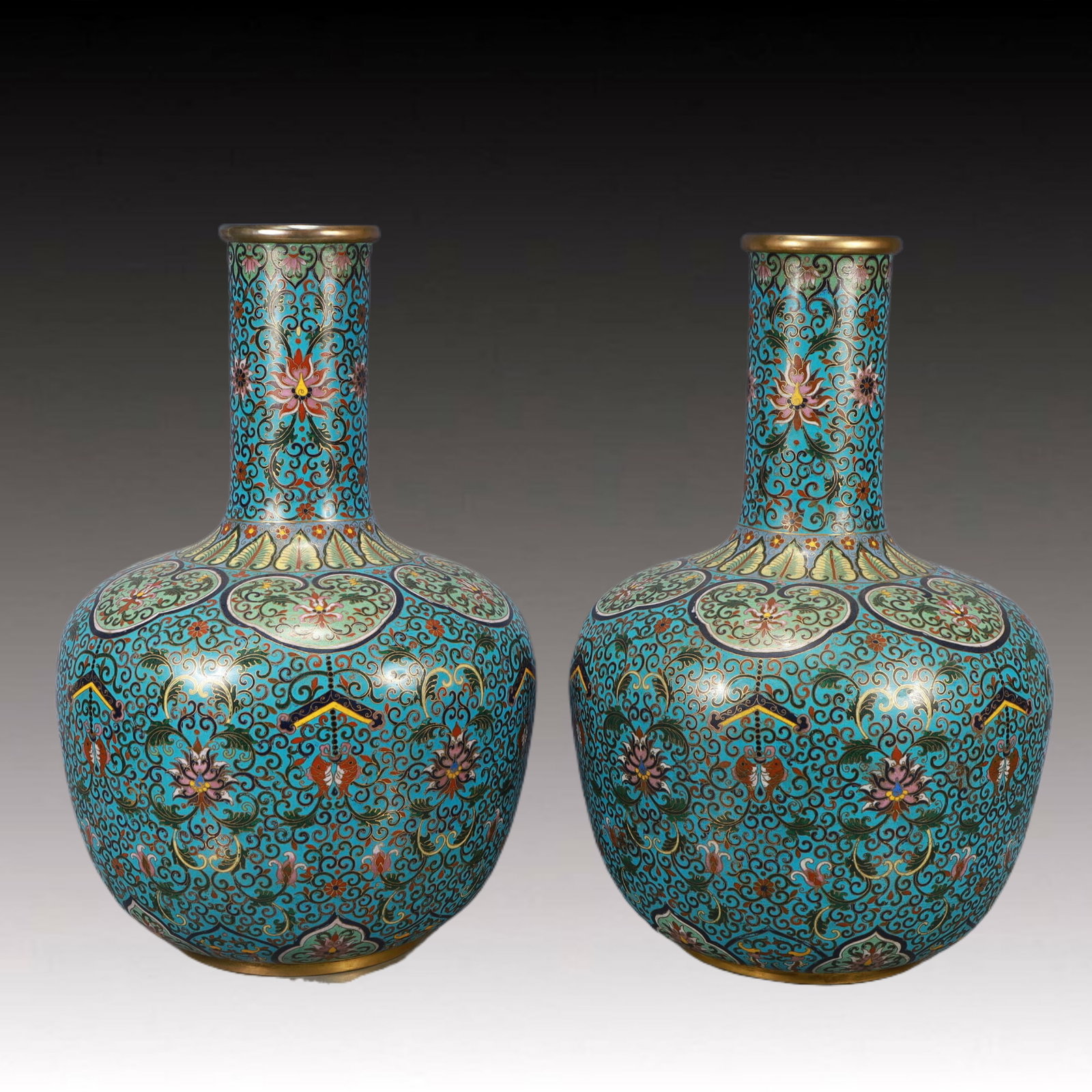 A Pair of Huge Cloisonne Lotus Pattern Vases: A Pair of Huge Cloisonne Lotus Pattern Vases,Qing Dynasty,China,Qianlong Four-character Mark,Size:12.6inx18.9in,Total Weight:9000g 一对景泰蓝缠枝莲ń