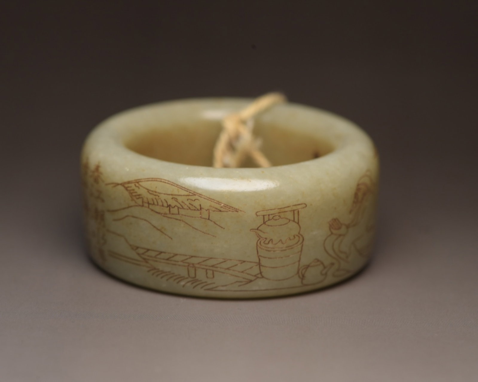 An Exquisite White Jade Landscape and Figure Pattern Ring,with poem: An Exquisite White Jade Landscape and Figure Pattern Ring,with poem,Qing Dynasty,China,Size:2.1inx2.1inx0.9in,Weight:76g 白玉山水人物纹环,带෻