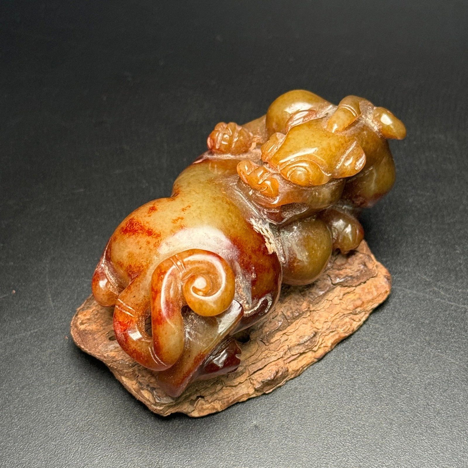 An Exquisite Archaic Jade Auspicious Beast Ornament: An Exquisite Archaic Jade Auspicious Beast Ornament,Ancient Time,China,Size:86mmx46mmx38mm,Weight:184g 高古玉瑞兽摆件,中国远古时