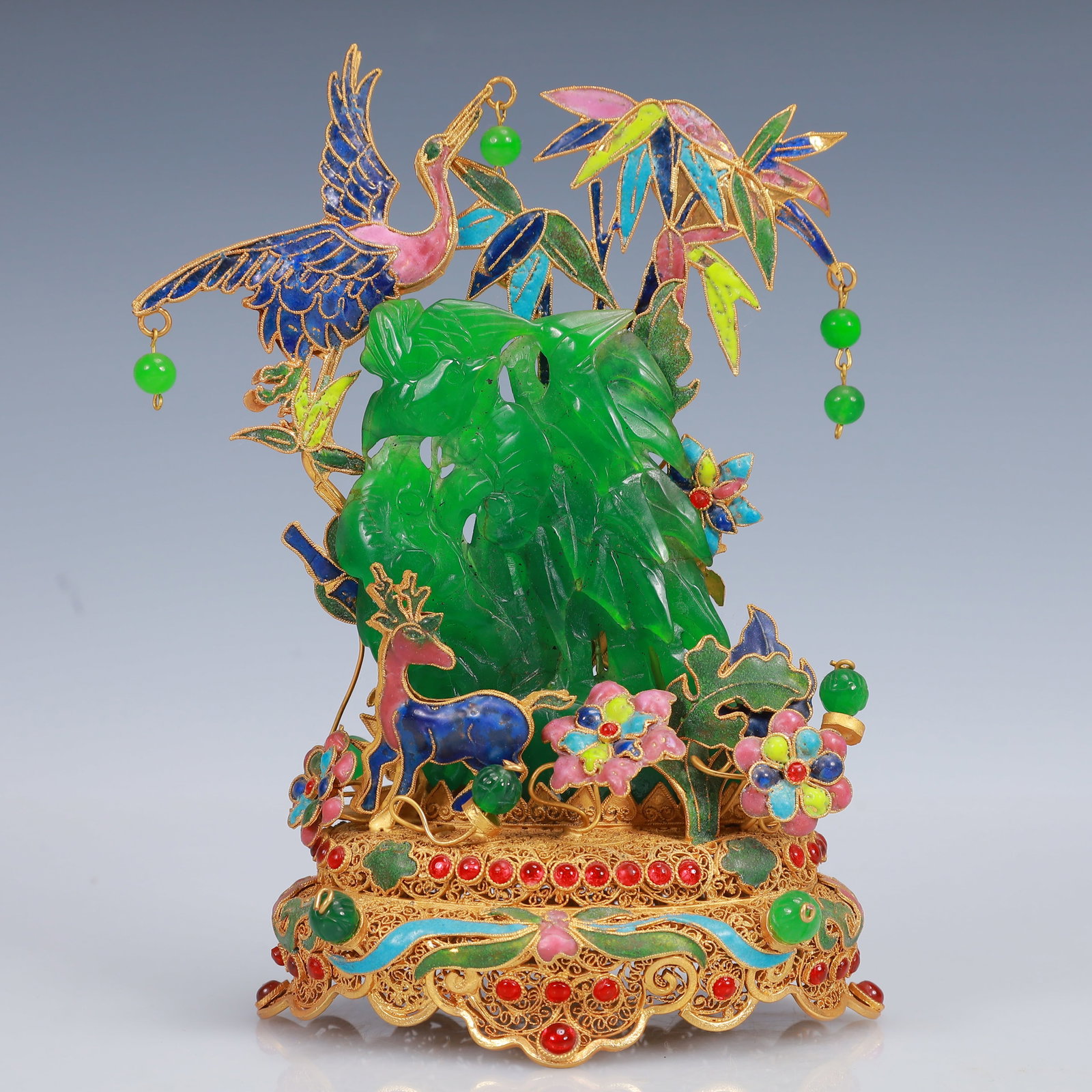An Exquisite Filigree and Gilding Inlaid Jadeite Flower and Bird Ornament,Inlaid Gems: An Exquisite Filigree and Gilding Inlaid Jadeite Flower and Bird Ornament,Inlaid Gems,Qing Dynasty, China,Qianlong Four-Character Mark,Size:4.7inx3.5inx7.1in,Weight:390g 花丝鎏ດ