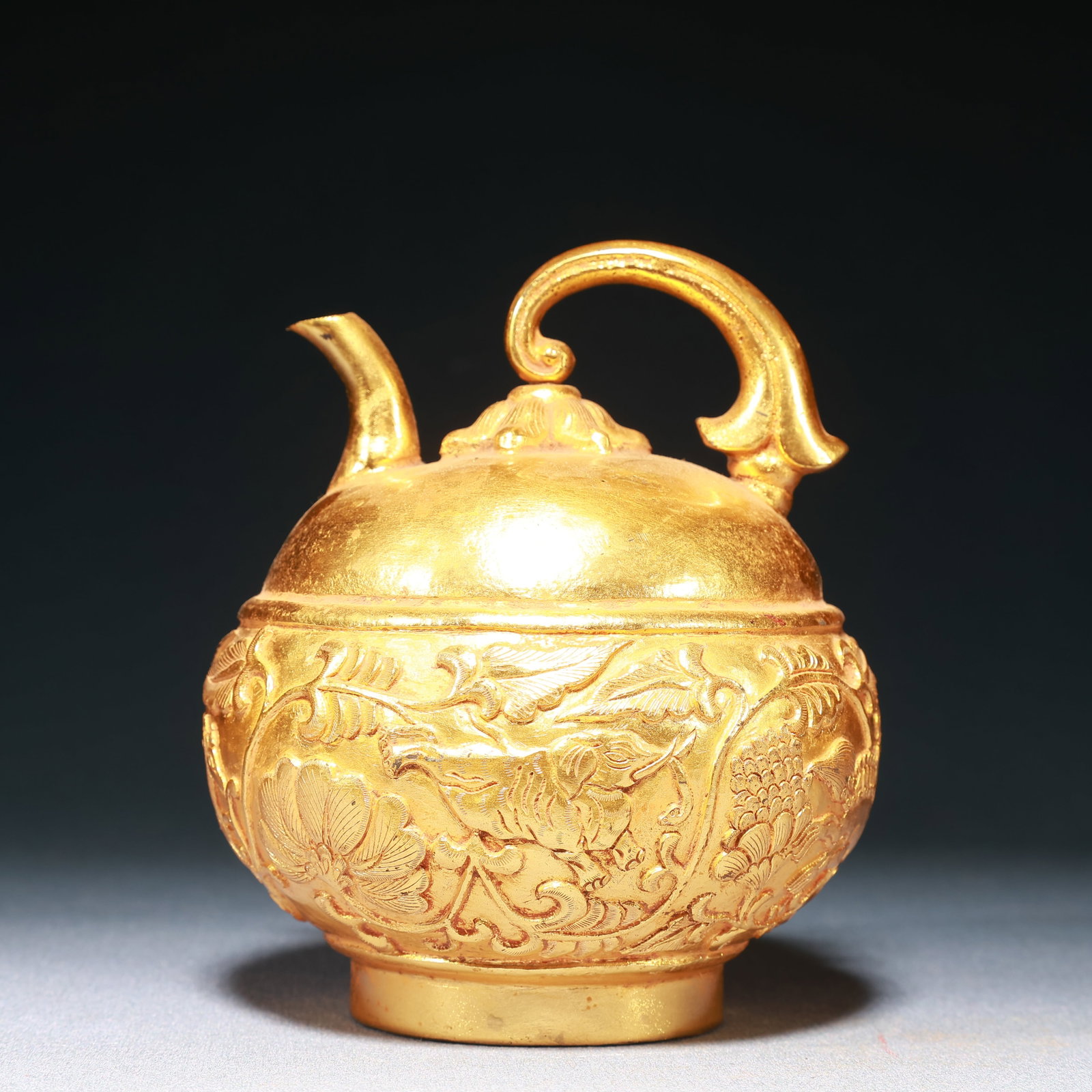 An Exquisite Gilt Bronze Lotus and Animal Pattern Ewer: An Exquisite Gilt Bronze Lotus and Animal Pattern Ewer,Qing Dynasty,China,Size:4.5inx5.5in,Weight:500g