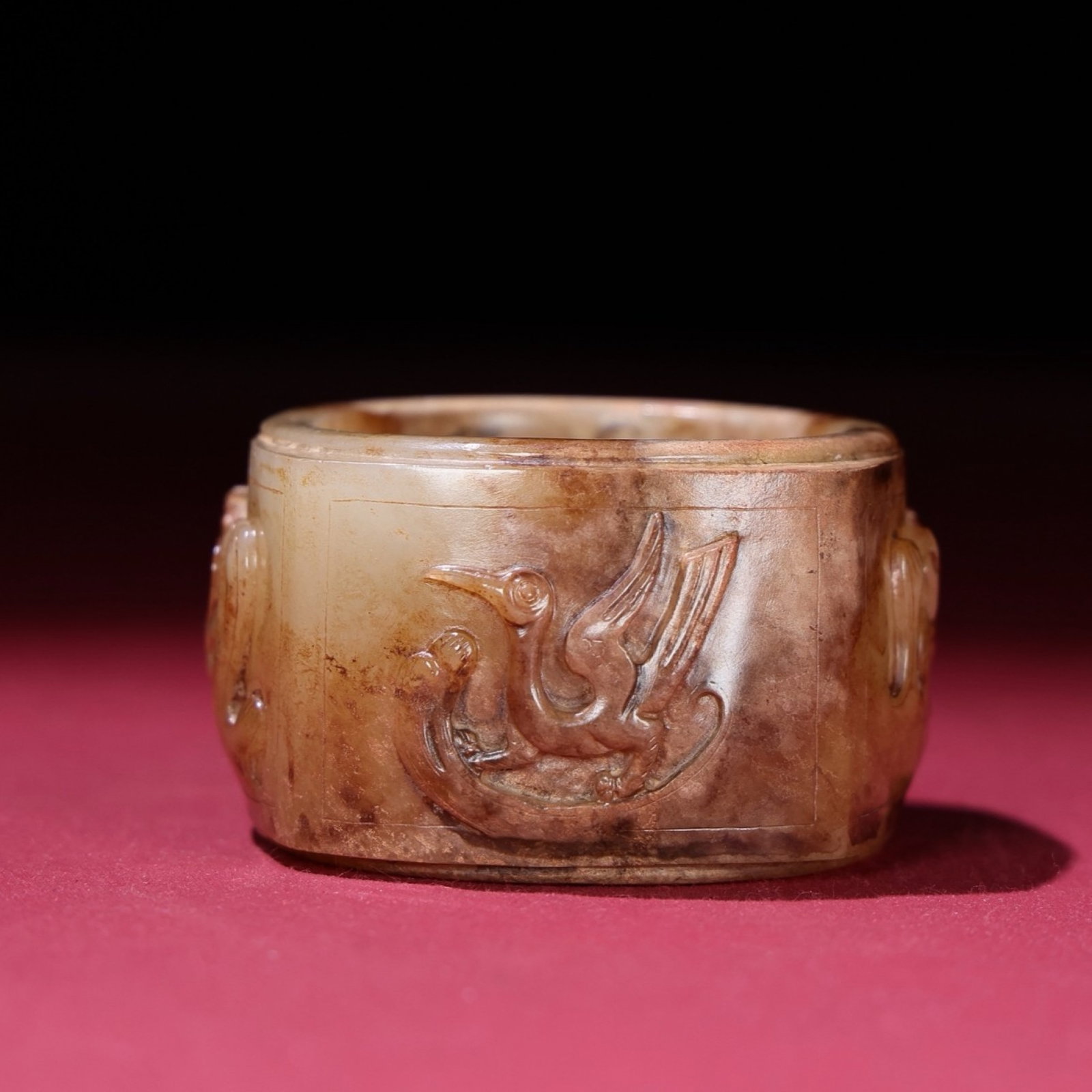 An Exquisite White Jade Dragon and Phoenix Pattern Thumb Ring: An Exquisite White Jade Dragon and Phoenix Pattern Thumb Ring,Qing Dynasty,China,Size:55mmx31mmx9mm,Weight:91g 白玉龙凤纹扳指,中国清代