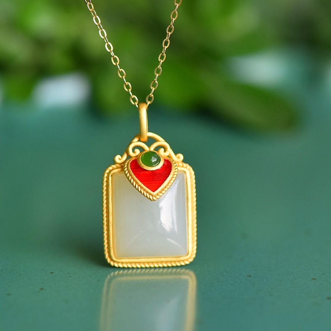 An Exquisite Sterling Silver-Gold Plated Inlaid White Jade Pendant: An Exquisite Sterling Silver-Gold Plated Inlaid White Jade Pendant 纯银镀金镶白玉吊坠