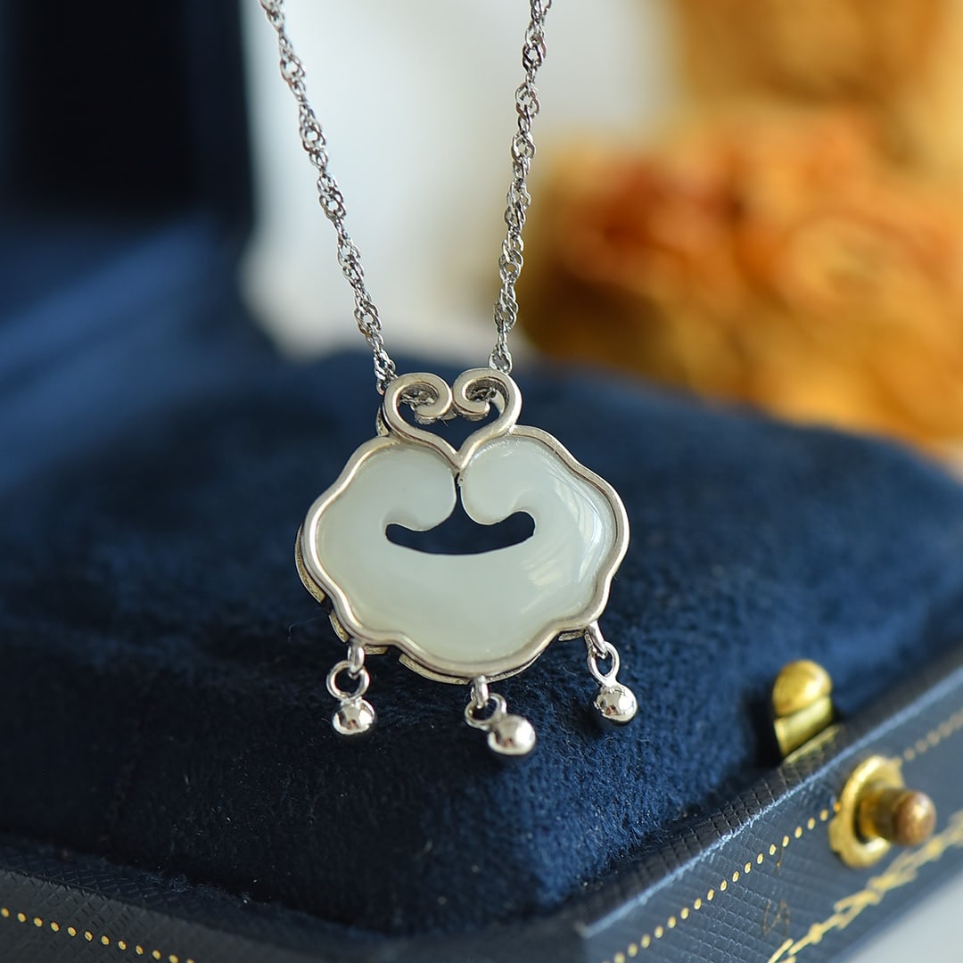 An Exquisite Sterling Silver Inlaid White Jade Pendant: An Exquisite Sterling Silver Inlaid White Jade Pendant, 纯银镶白玉吊坠