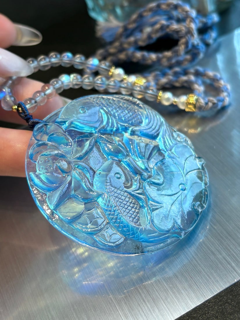 An Exquisite Aquamarine Fish Pattern Pendant: An Exquisite Aquamarine Fish Pattern Pendant,Size:55mmx8mm,Weight:44.8g 海蓝宝鱼纹挂件