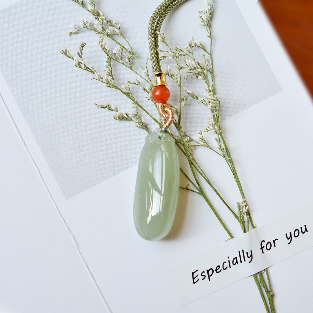 An Exquisite Greenish Jade Pendant: An Exquisite Greenish Jade Pendant,Size: 14mmx34mm 青玉挂件