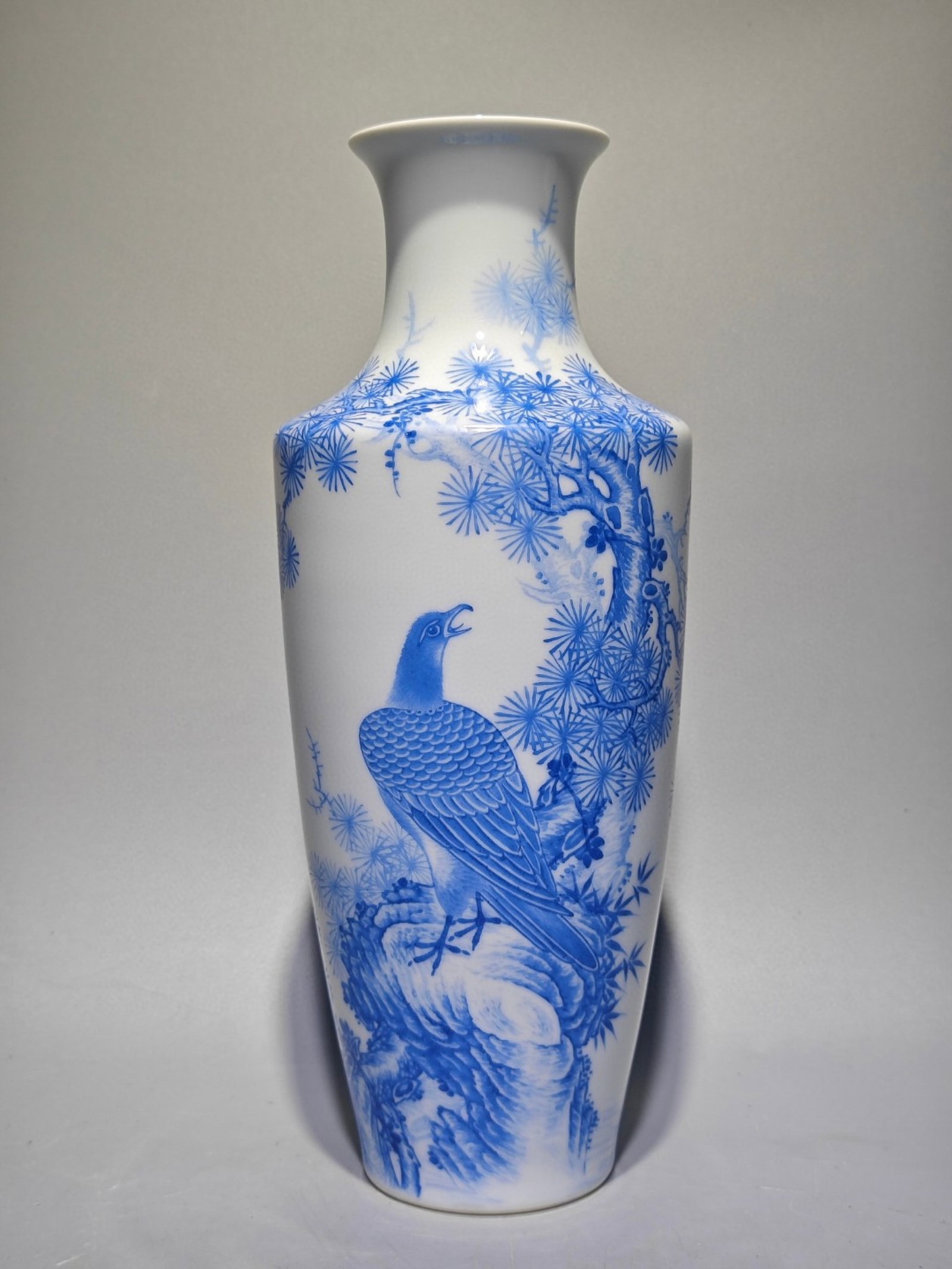 An Exquisite Blue Glazed Pine and Eagle Pattern Vase,with poem: An Exquisite Blue Glazed Pine and Eagle Pattern Vase,with poem,Qing Dynasty,China,Yongzheng Four-character Mark,Size:10.1inx4.1in 蓝釉松鹰纹瓶,带诗ă