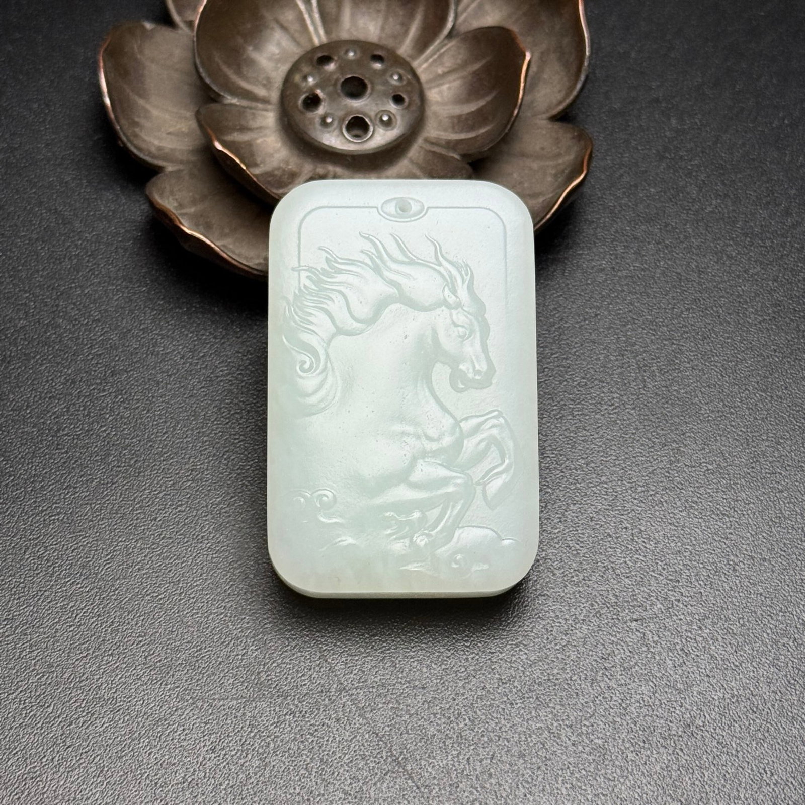 An Exquisite White Jade Horse Pattern Pendant: An Exquisite White Jade Horse Pattern Pendant,Qing Dynasty,China,Size:30mmx47mmx11mm,Weight:41g 白玉骏马纹牌,中国清代