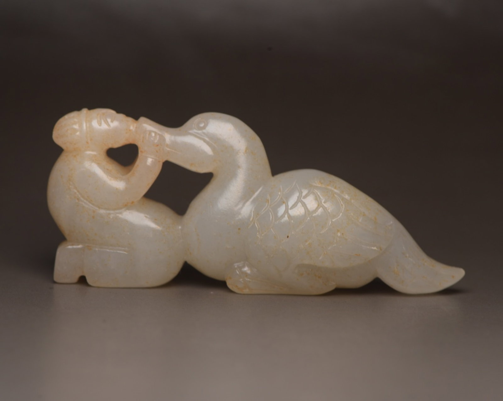 An Exquisite White Jade Goose Ornament: An Exquisite White Jade Goose Ornament,Qing Dynasty,China,Size:3.2inx1.3inx0.8in,Weight:63g 白玉鹅摆件,中国清代