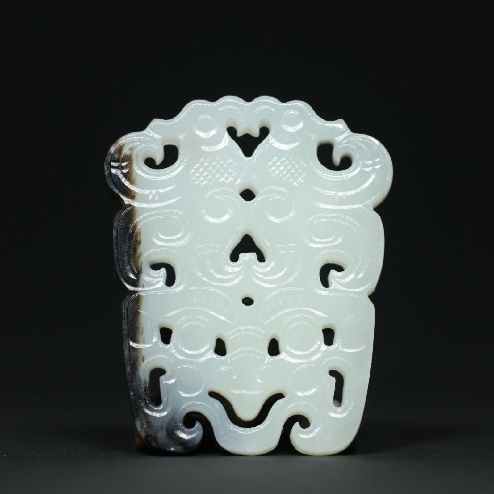 An Exquisite White Jade Beast-Face Pattern Pendant: An Exquisite White Jade Beast-Face Pattern Pendant,Qing Dynasty,China,Size:2.2inx1.8inx0.2in,Weight:32.7g 白玉兽面纹挂件,中国清代