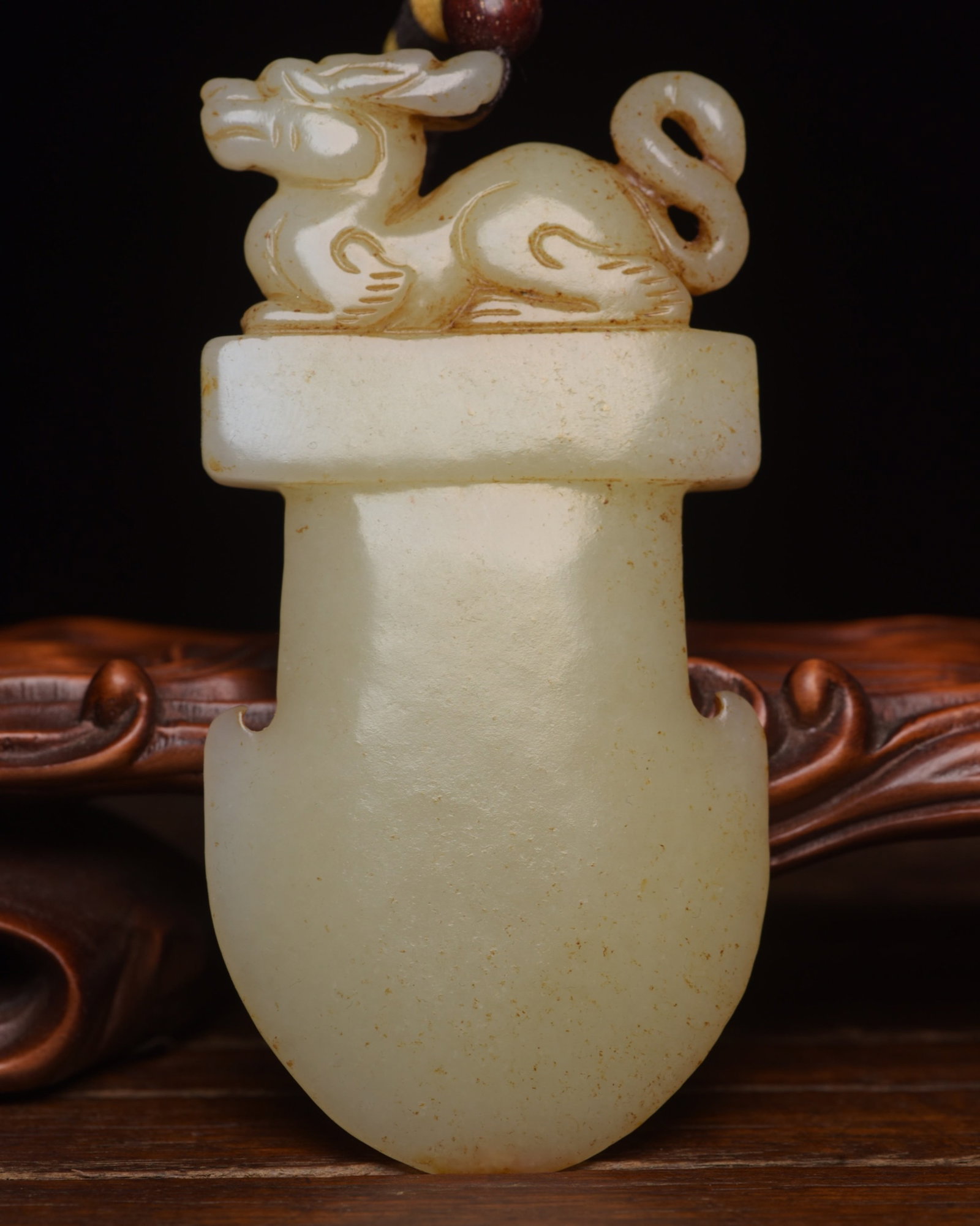 An Exquisite White Jade Dragon Axe: An Exquisite White Jade Dragon Axe,Qing Dynasty,China,Size:3.5inx1.7inx0.4in,Weight:76g 白玉龙斧头,中国清代
