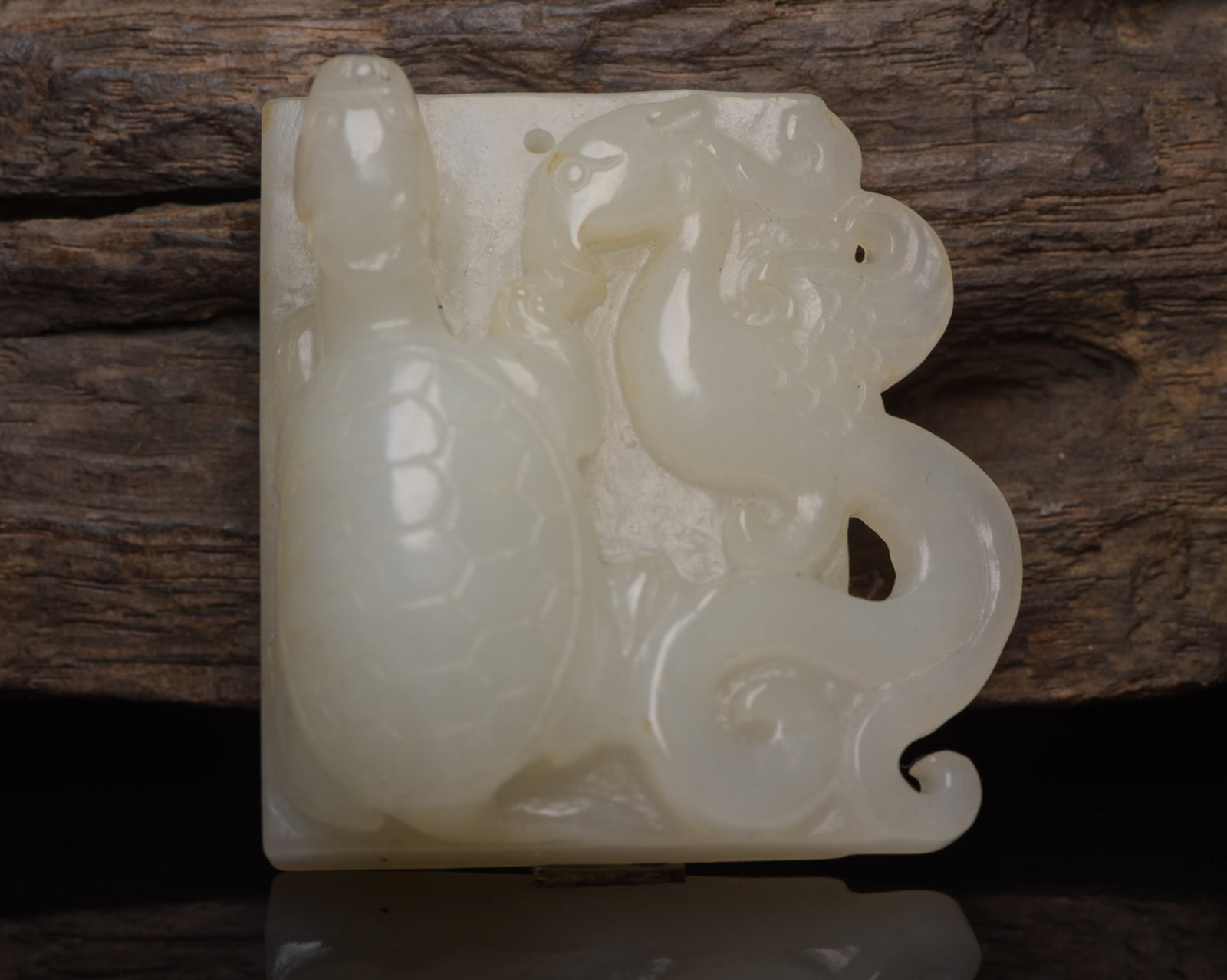 An Exquisite White Jade Phoenix Pattern Ornament: An Exquisite White Jade Phoenix Pattern Ornament,Qing Dynasty,China,Size:2inx2inx0.8in,Weight:72g 白玉凤纹摆件,中国清代