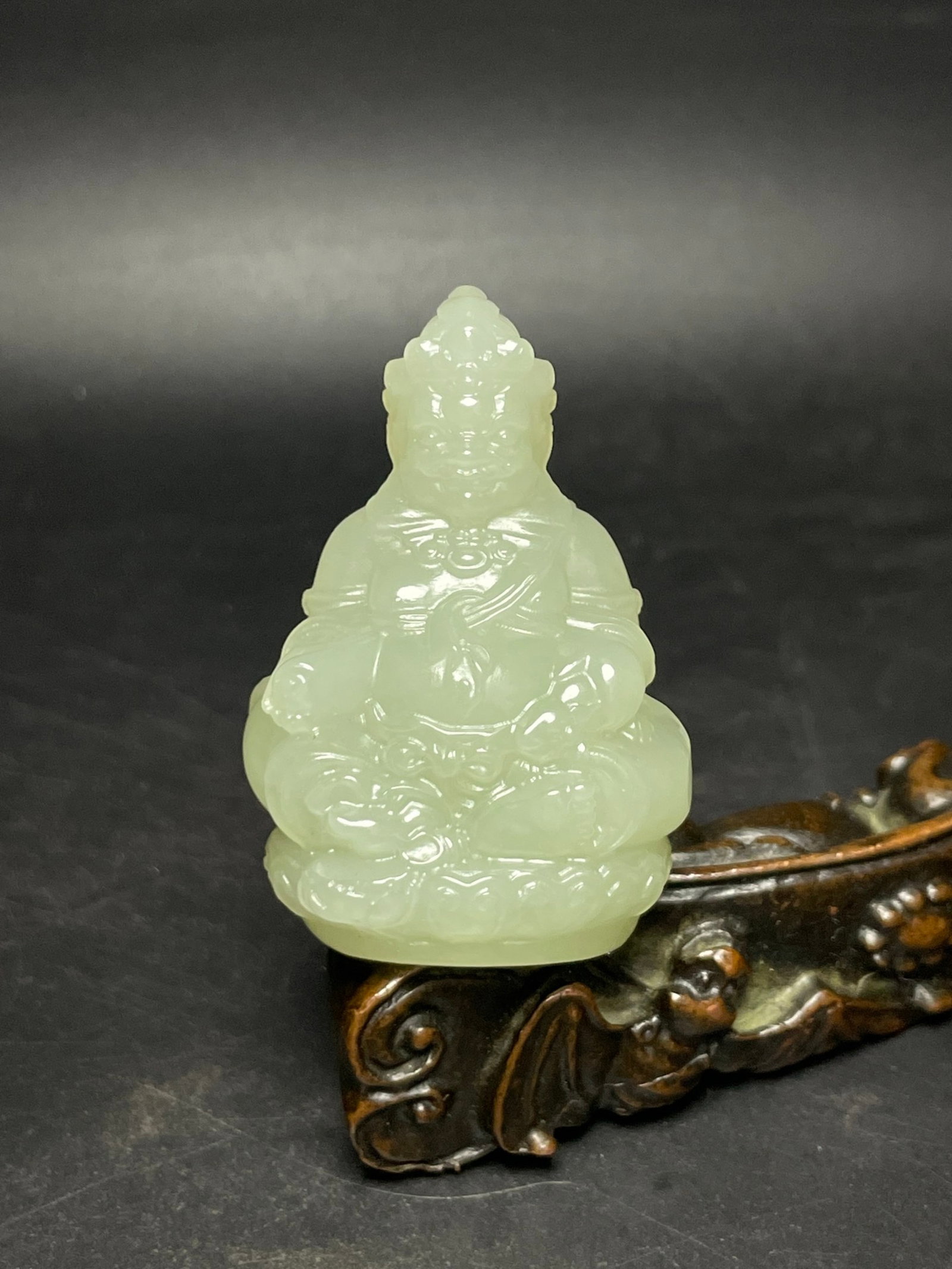 An Exquisite White Jade Statue of Mammon: An Exquisite White Jade Statue of Mammon ,Qing Dynasty, China,Size:35mmx52mmx24mm,Weight:53g 白玉财神像,中国清代