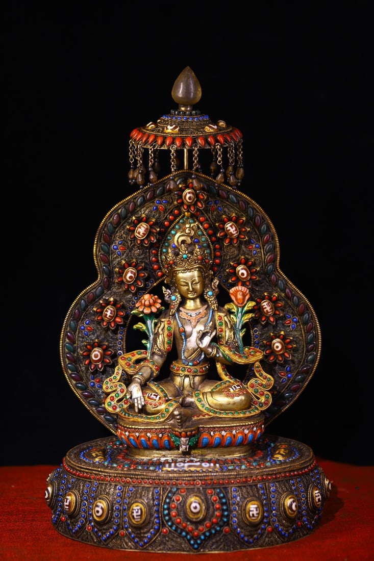 An Exquisite Silver Inlaid Dzi Bead and Gems Statue of Tara: An Exquisite Silver Inlaid Dzi Bead and Gems Statue of Tara,Qing Dynasty,China,Size:17.7inx10.6in,Weight:3750g 银嵌天珠和宝石度母像,中