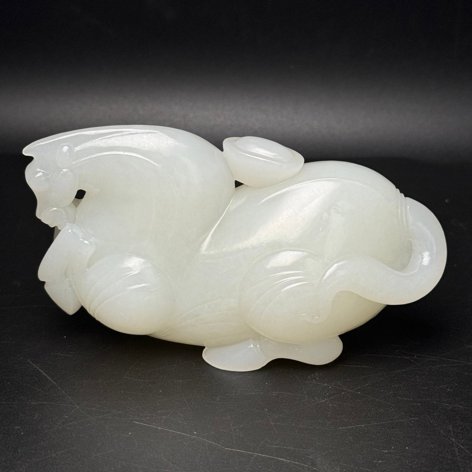 An Exquisite White Jade Horse Ornament: An Exquisite White Jade Horse Ornament,Qing Dynasty,China,Size:112mmx62mmx47mm,Weight:375g 白玉骏马摆件,中国清代