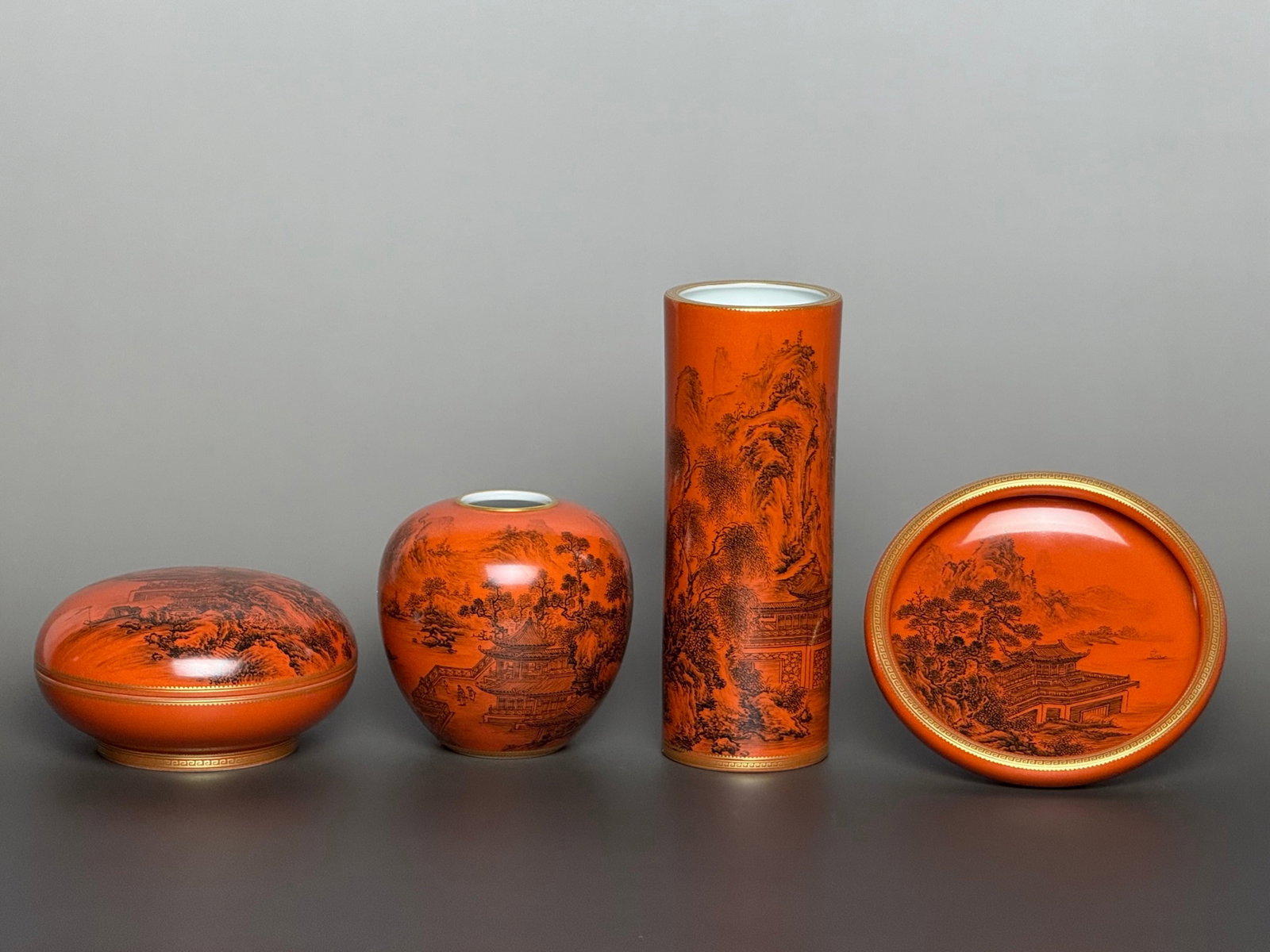 A Set of Fine Exquisite Iron-Red Landscape Pattern Ornaments: A Set of Fine Exquisite Iron-Red Landscape Pattern Ornaments,Qing Dynasty, China,Qianlong Six-character Mark,Size:2.1inx5.6in(Brush Pot),3.1inx3.1in(Jar),4.3inx1.1in(Brush Washer),3.9inx2.2in(Box) 