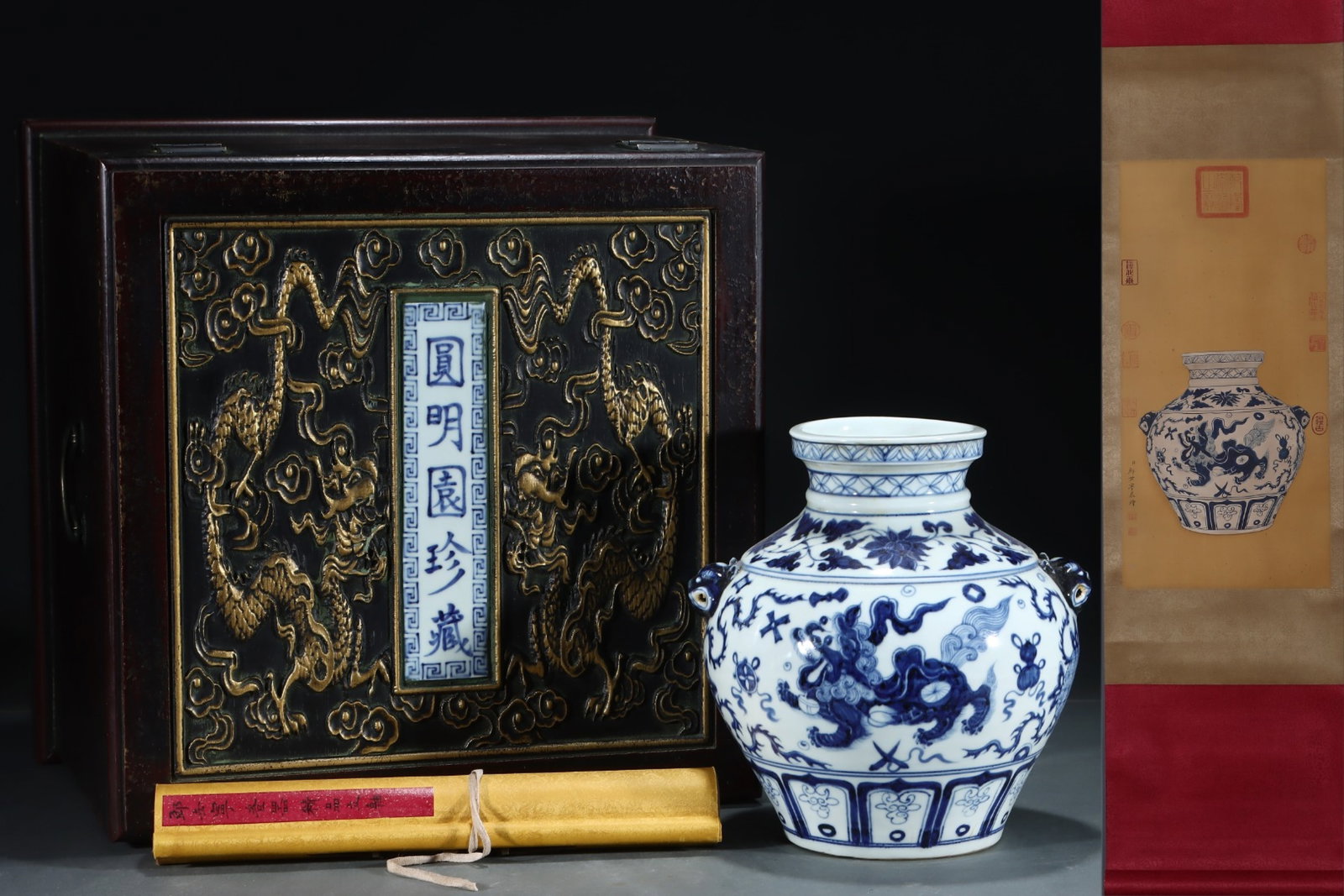 An Exquisite Blue and White Lotus and Lion Pattern Beast-Ears Jar,with Chinese Vertical Scroll Ink: An Exquisite Blue and White Lotus and Lion Pattern Beast-Ears Jar,with Chinese Vertical Scroll Ink Painting on Silk,Yuan Dynasty,China,Size:(Porcelain)10.6inx10.4in,(Without frame)24.8inx12in 青