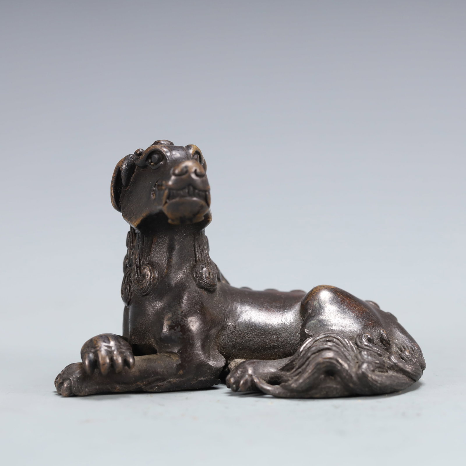 An Exquisite Bronze Auspicious Beast Ornament: An Exquisite Bronze Auspicious Beast Ornament,Qing Dynasty, China,Size:2.8inx1.5inx1.8in Weight:223.7g 铜瑞兽摆件,中国清代