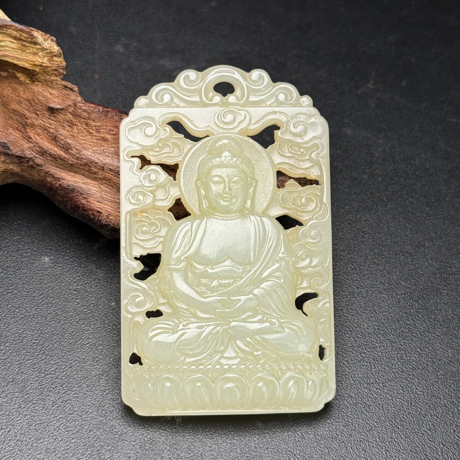 An Exquisite White Jade Statue of Sakyamuni Pendant: An Exquisite White Jade Statue of Sakyamuni Pendant,Qing Dynasty,China,Size:62mmx38mmx7mm,Weight:28g 白玉如来像佩,中国清代