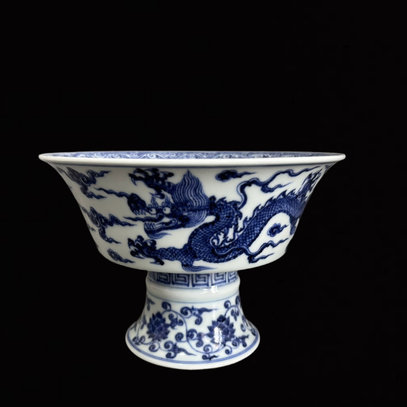 An Exquisite Blue and White Auspicious Cloud and Dragon Pattern Stem Cup: An Exquisite Blue and White Auspicious Cloud and Dragon Pattern Stem Cup,Ming Dynasty,China,Xuande Six-character Mark,Size:5.3inx7.3in 青花祥云龙纹高足&
