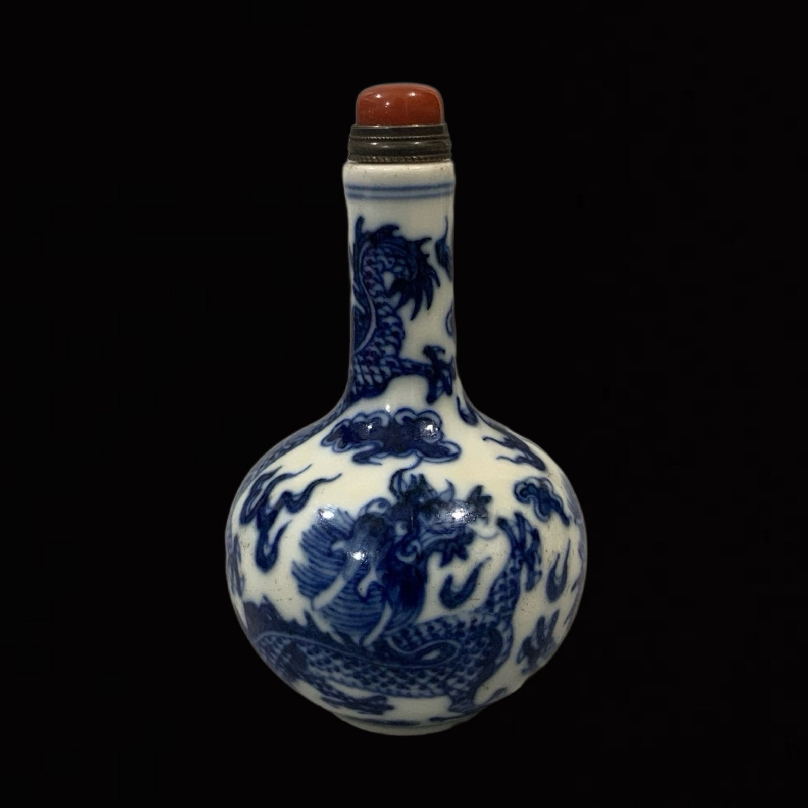 An Exquisite Blue and White Auspicious Cloud and Dragon Pattern Snuff Bottle: An Exquisite Blue and White Auspicious Cloud and Dragon Pattern Snuff Bottle,Qing Dynasty,China,Yongzheng Six-character Mark,Size:3.7inx2.1in 青花祥云龙纹鼻&#