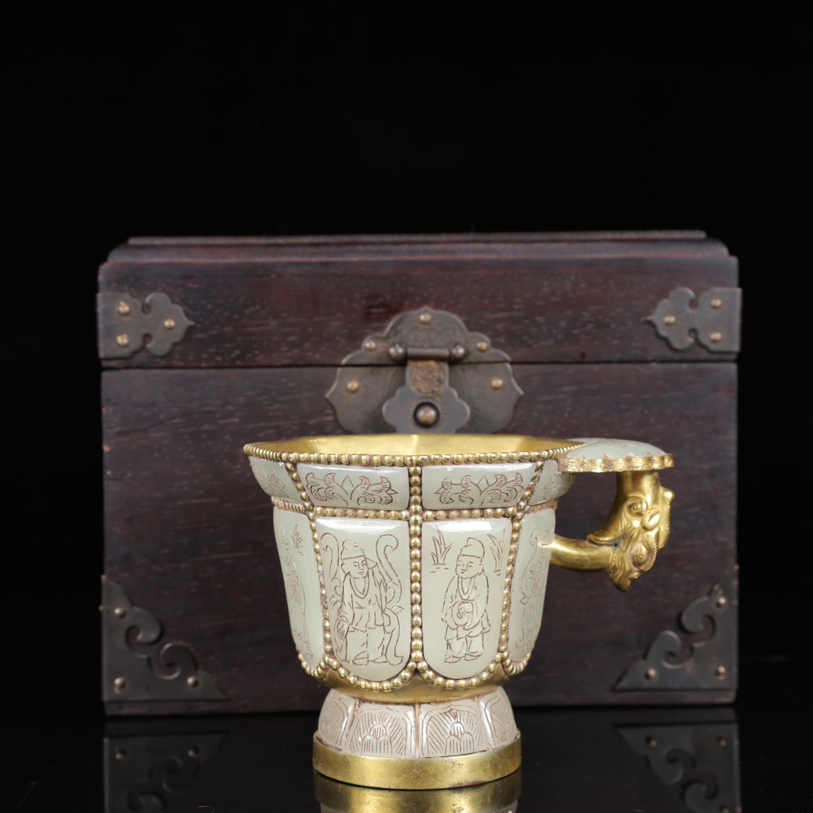 An Exquisite White Jade Cover with Gold Figure Pattern Cup: An Exquisite White Jade Cover with Gold Figure Pattern Cup,Qing Dynasty,China,Qianlong Four-character Mark,Size:(Cup)3.9inx3.1inx3in,(Box)8.3inx6.7inx5.1in,Weight:300g 白玉包金