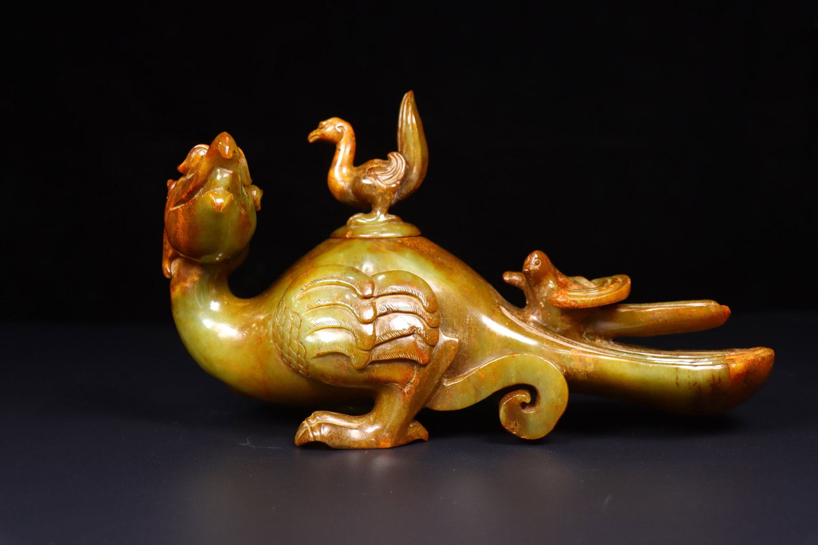 An Exquisite Yellow Jade phoenix-Shaped Censer: An Exquisite Yellow Jade phoenix-Shaped Censer,Qing Dynasty, China,Size:9.1inx3.5inx5.5in,Weight:1714g 黄玉凤形香炉,中国清代