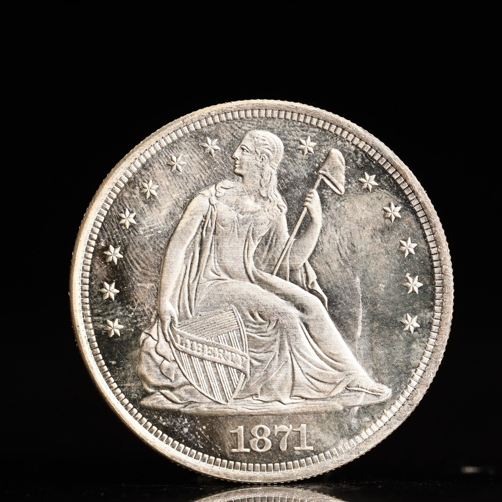 USA One Dollar 1871 Coin: American coin. IN GOD WE TRUST / LIBERTY / 1871 / UNITED STATES OF AMERICA / ONE DOL. Mint mark: CC.Weight:26.9g.