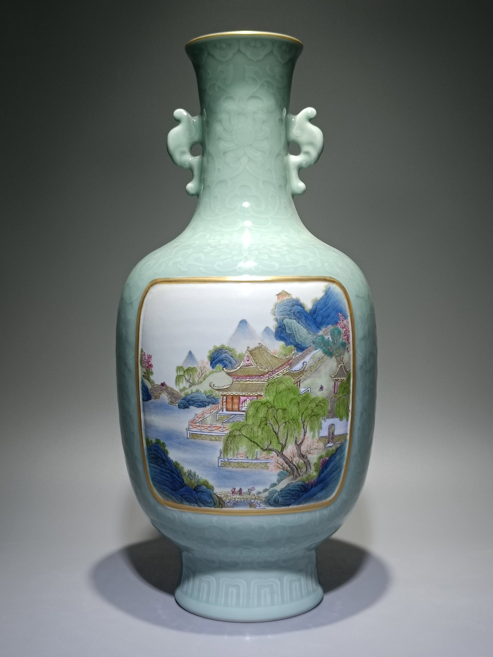 A Huge Celadon Glazed Landscape Pattern Double-Ears Vase: A Huge Celadon Glazed Landscape Pattern Double-Ears Vase,Qing Dynasty,China,Qianlong Six-character Mark,Size:16.8inx7.7in 青釉山水纹双耳瓶,中Þ