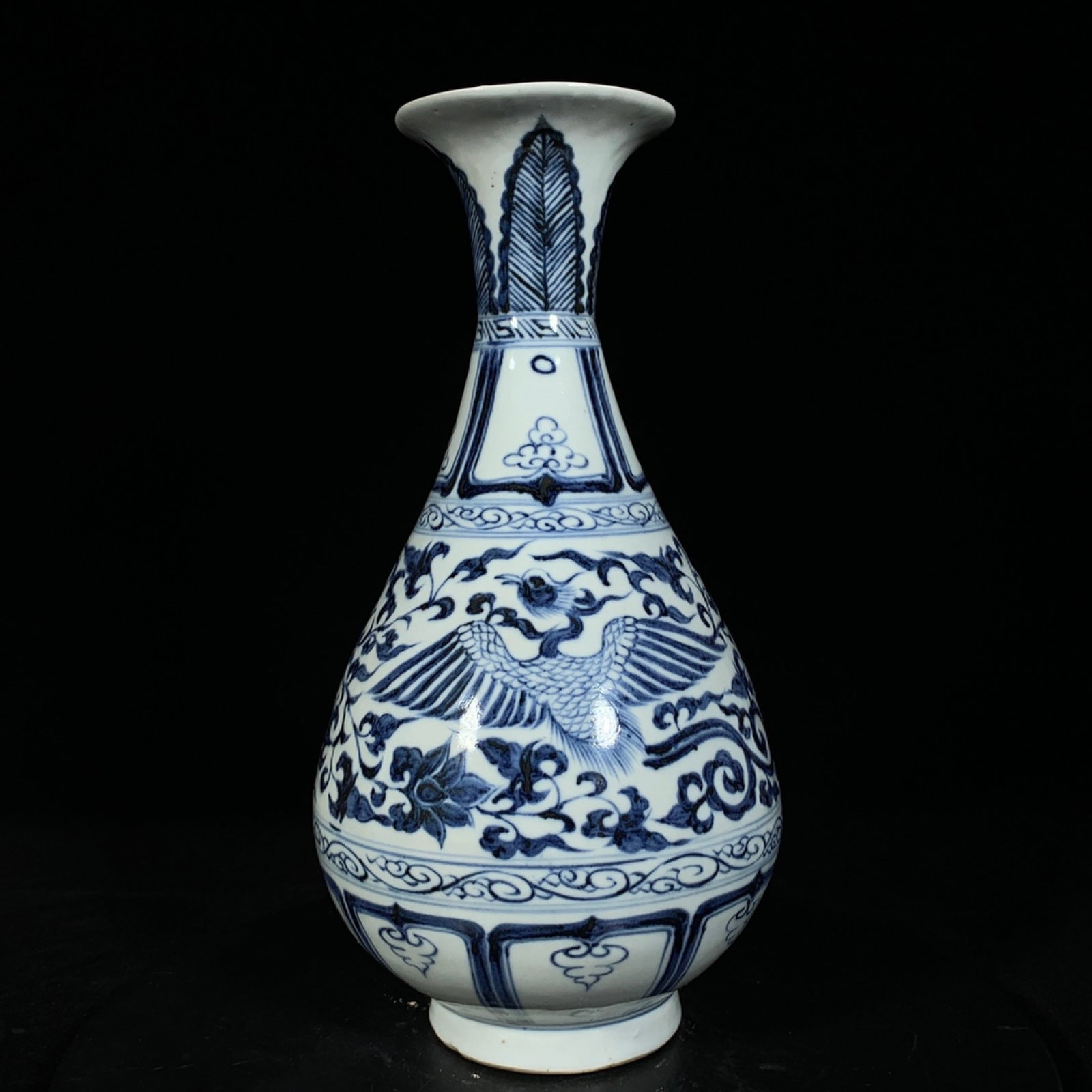 An Exquisite Blue and White Flower and Phoenix Pattern Vase: An Exquisite Blue and White Flower and Phoenix Pattern Vase,Yuan Dynasty,China,Size:11.4inx5.5in 青花花卉凤纹瓶,中国元代