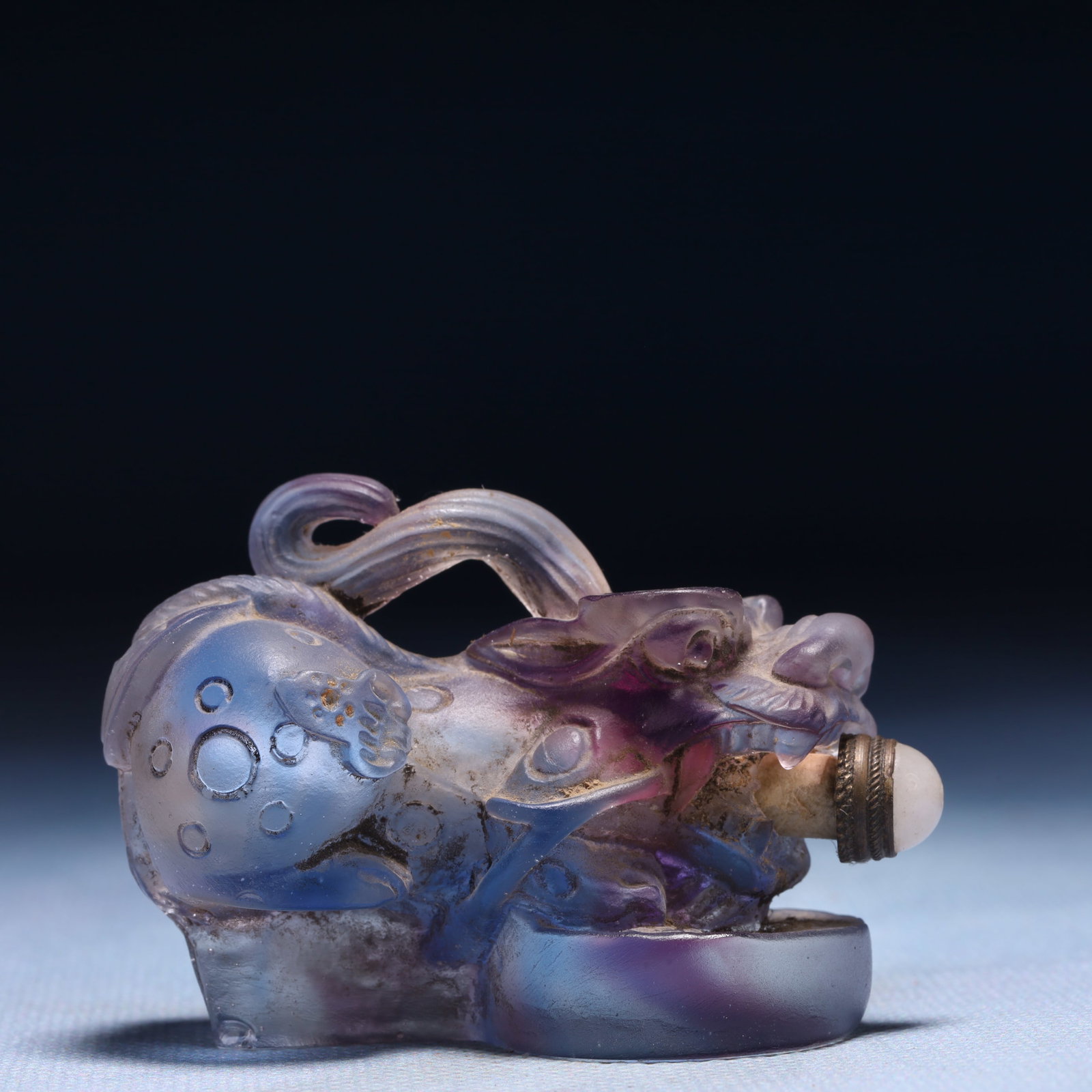 An Exquisite Crystal Auspicious Beast Snuff Bottle: An Exquisite Crystal Auspicious Beast Snuff Bottle,Qing Dynasty,China,Size:2.4inx1.2inx1.6in,Weight:86g 水晶瑞兽鼻烟壶,中国清代