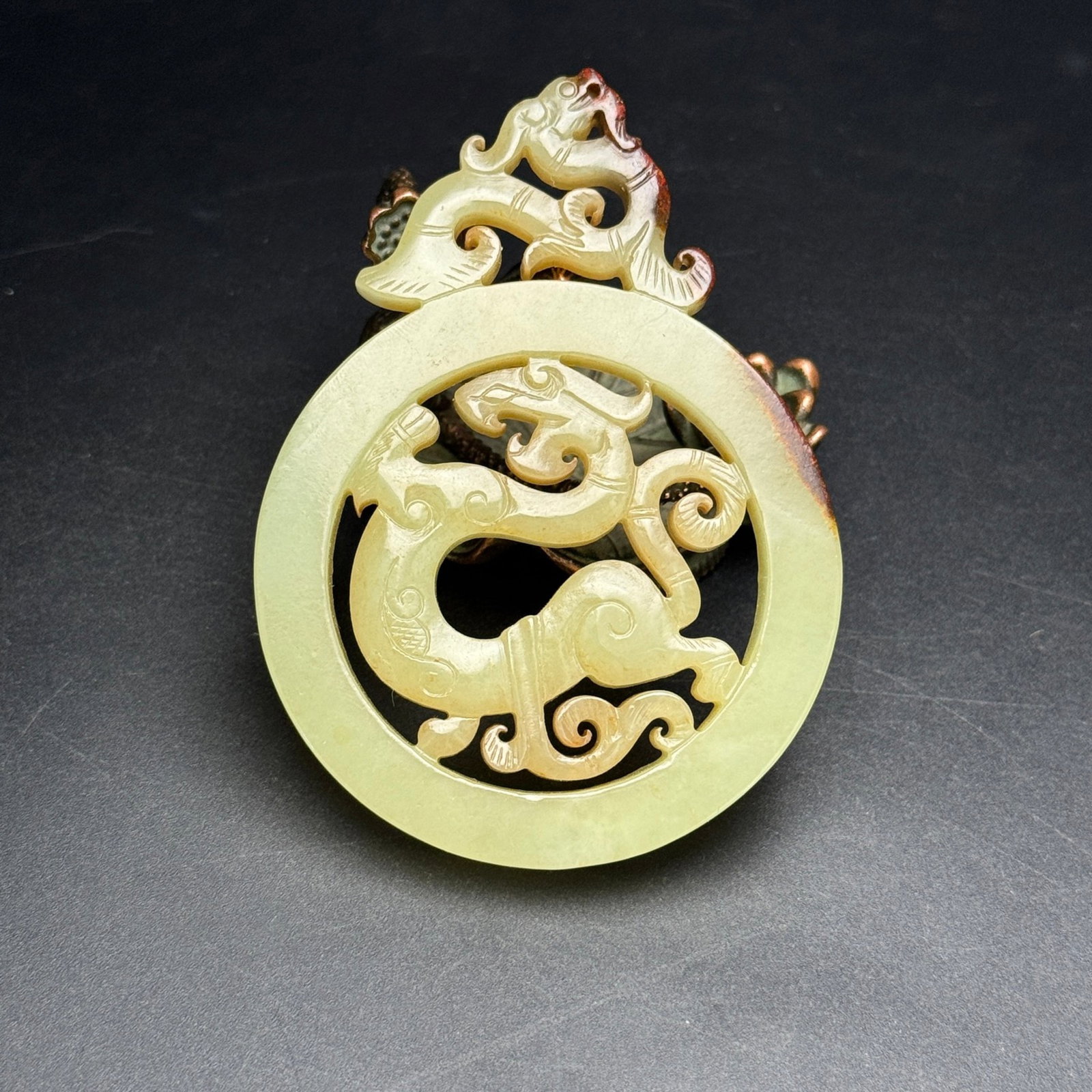 An Exquisite White Jade Dragon Pattern Pendant: An Exquisite White Jade Dragon Pattern Pendant,Qing Dynasty,China,Size:83mmx60mmx7mm,Weight:52g 白玉龙纹佩,中国清代