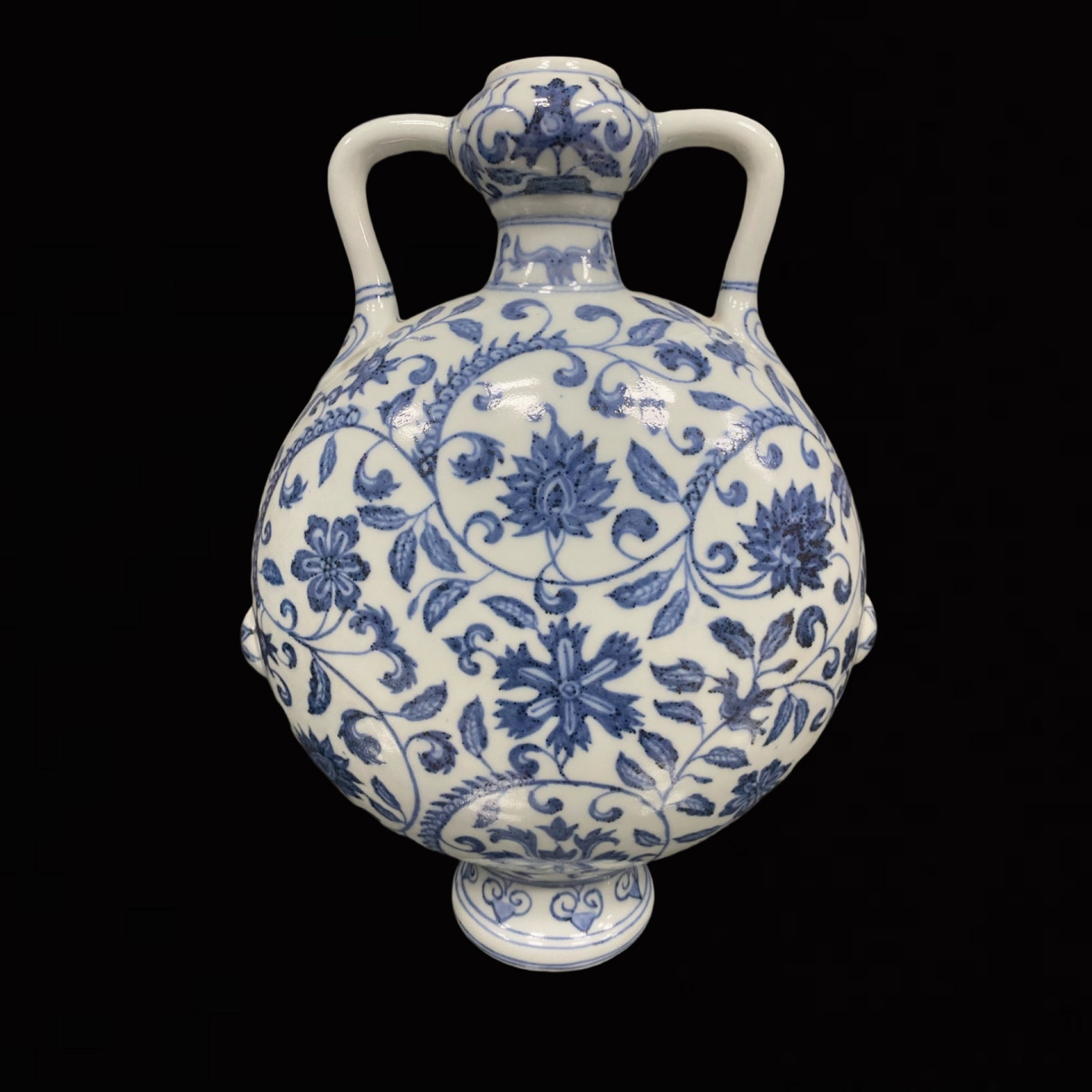 An Exquisite Blue and White Flower Pattern Double-Ears Vase: An Exquisite Blue and White Flower Pattern Double-Ears Vase,Qing Dynasty,China,Size:11inx1.6in 青花花卉纹双耳瓶,中国清代