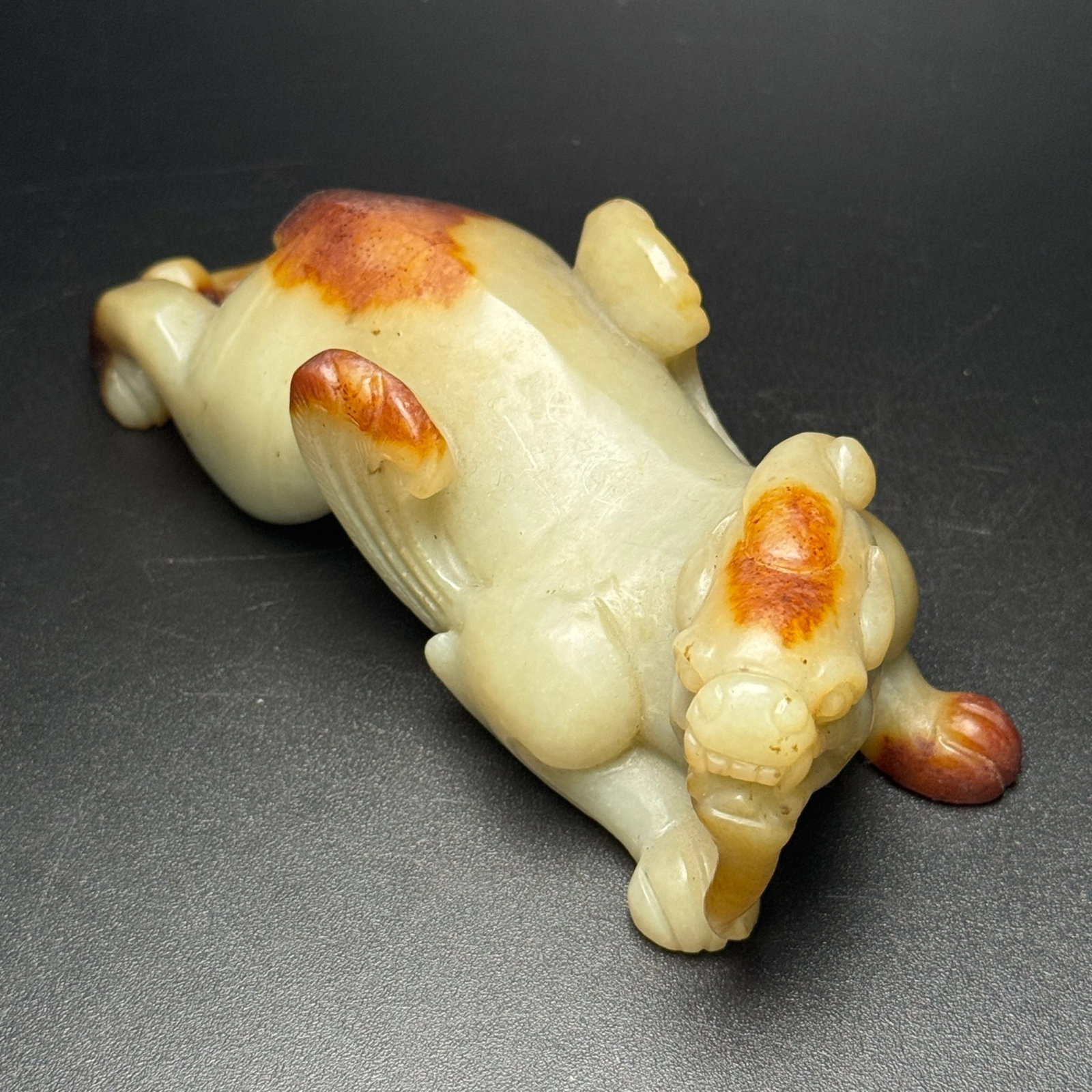 An Exquisite White Jade Auspicious Beast Ornament: An Exquisite White Jade Auspicious Beast Ornament,Qing Dynasty,China,Size:132mmx50mmx43mm,Weight:381g 白玉瑞兽摆件,中国清代