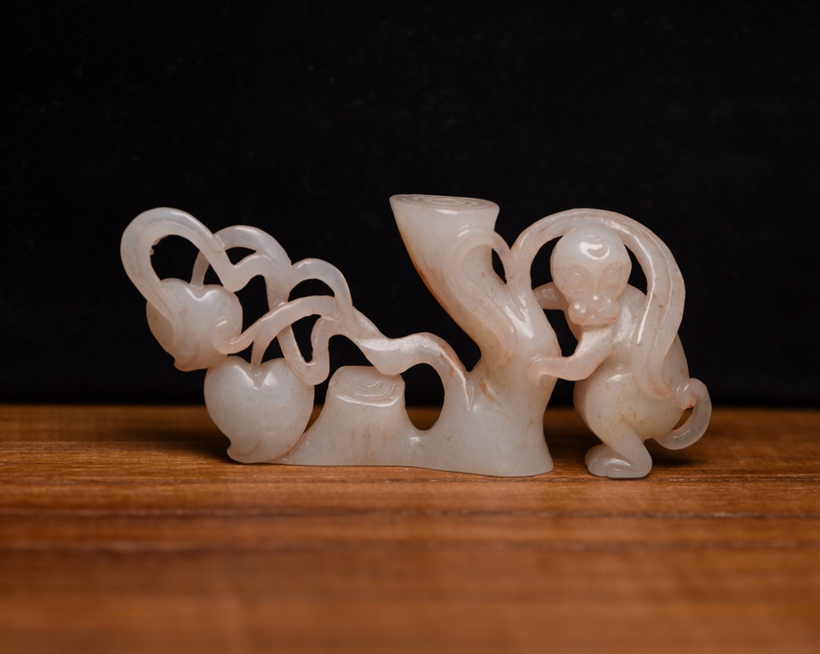 An Exquisite White Jade Monkey Ornament: An Exquisite White Jade Monkey Ornament,Qing Dynasty,China,Size:3.1inx1.4inx0.5in,Weight:33g 白玉猴子摆件,中国清代