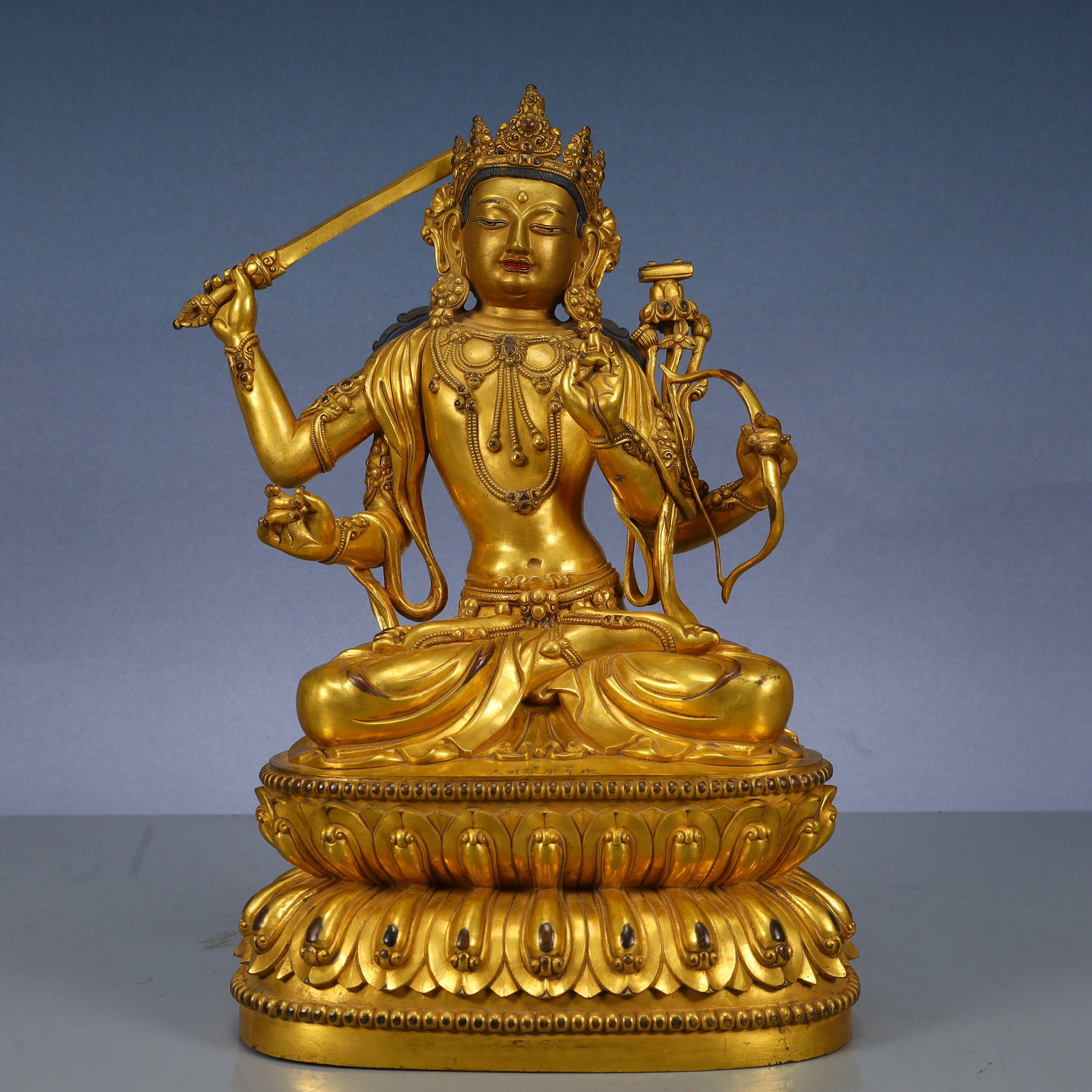 A Solemn Gilt Bronze Statue of Manjusri: A Solemn Gilt Bronze Statue of Manjusri,Ming Dynasty, China,Yongle Six-character Mark,Size:7.9inx5.5inx13in,Weight:6200g 铜鎏金文殊菩萨像,中ࢲ