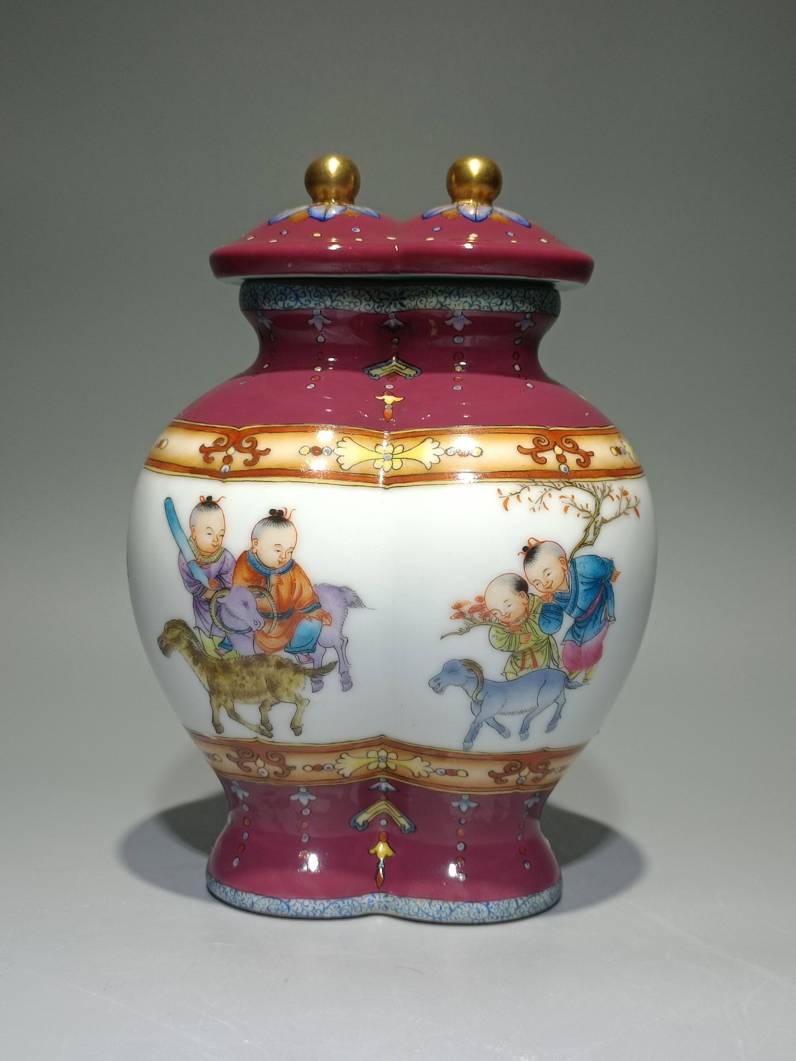 An Exquisite Ruby Red-Glazed Enamel Character and Story Pattern Jar with Cover (1 of 8)