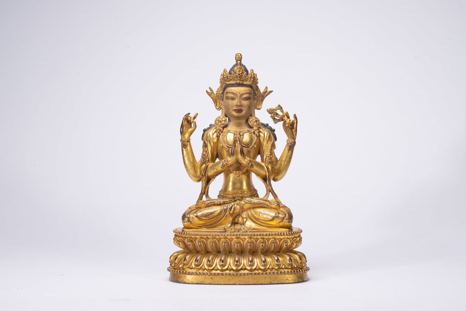 A Solemn Gilt Bronze Statue of Four-Arms Avalokitesvara: A Solemn Gilt Bronze Statue of Four-Arms Avalokitesvara,Qing Dynasty,China,Size:5.9inx4.3inx9.8in,Weight:2540g