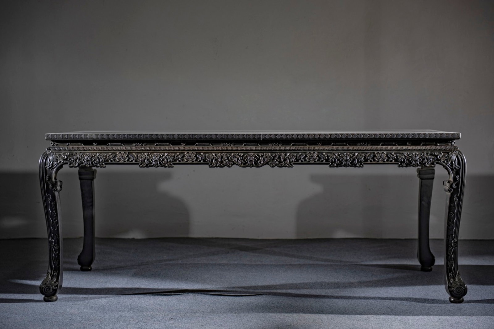 An Exquisite Zitanwood Lotus Pattern Long Table: An Exquisite Zitanwood Lotus Pattern Long Table,Qing Dynasty, China,Size:78inx34.6inx32.3in 一个精美的紫檀木缠枝莲纹条