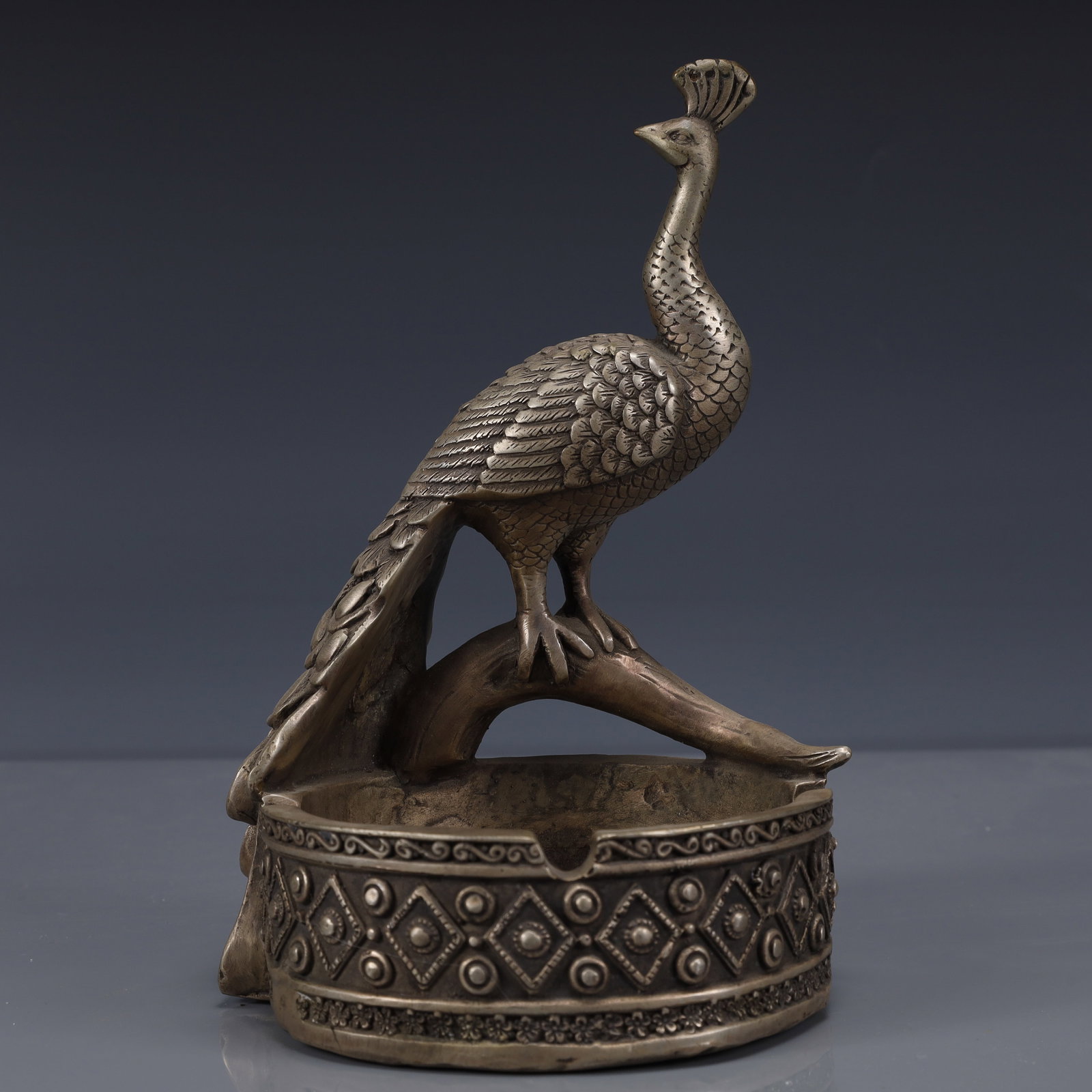 An Exquisite Silver-Plated Bronze peacock Ornament: An Exquisite Silver-Plated Bronze peacock Ornament,Qing Dynasty, China,Qianlong Four-character Mark,Size:4.7inx4.3inx7.5in,Weight:1200g 铜镀银孔雀摆件,中