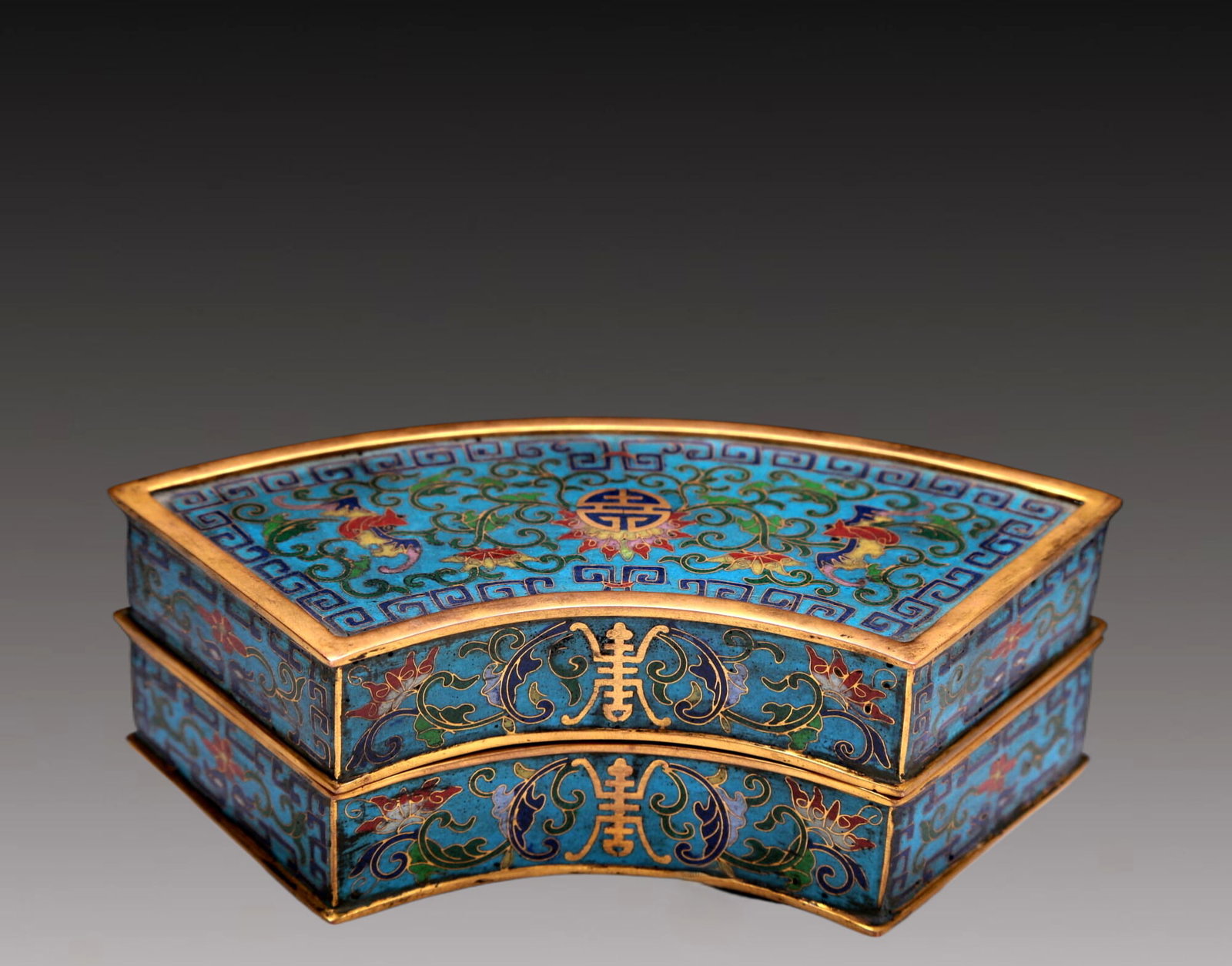 An Exquisite Cloisonne 'Scrolling Lotus& Bat' Box: An Exquisite Cloisonne 'Scrolling Lotus& Bat' Box. Enamaled with polychrome patterns and angular scrolls, all reserved on a bright turquoise ground. Chinese Qing Dynasty. Qianlong Four-Character Mark.