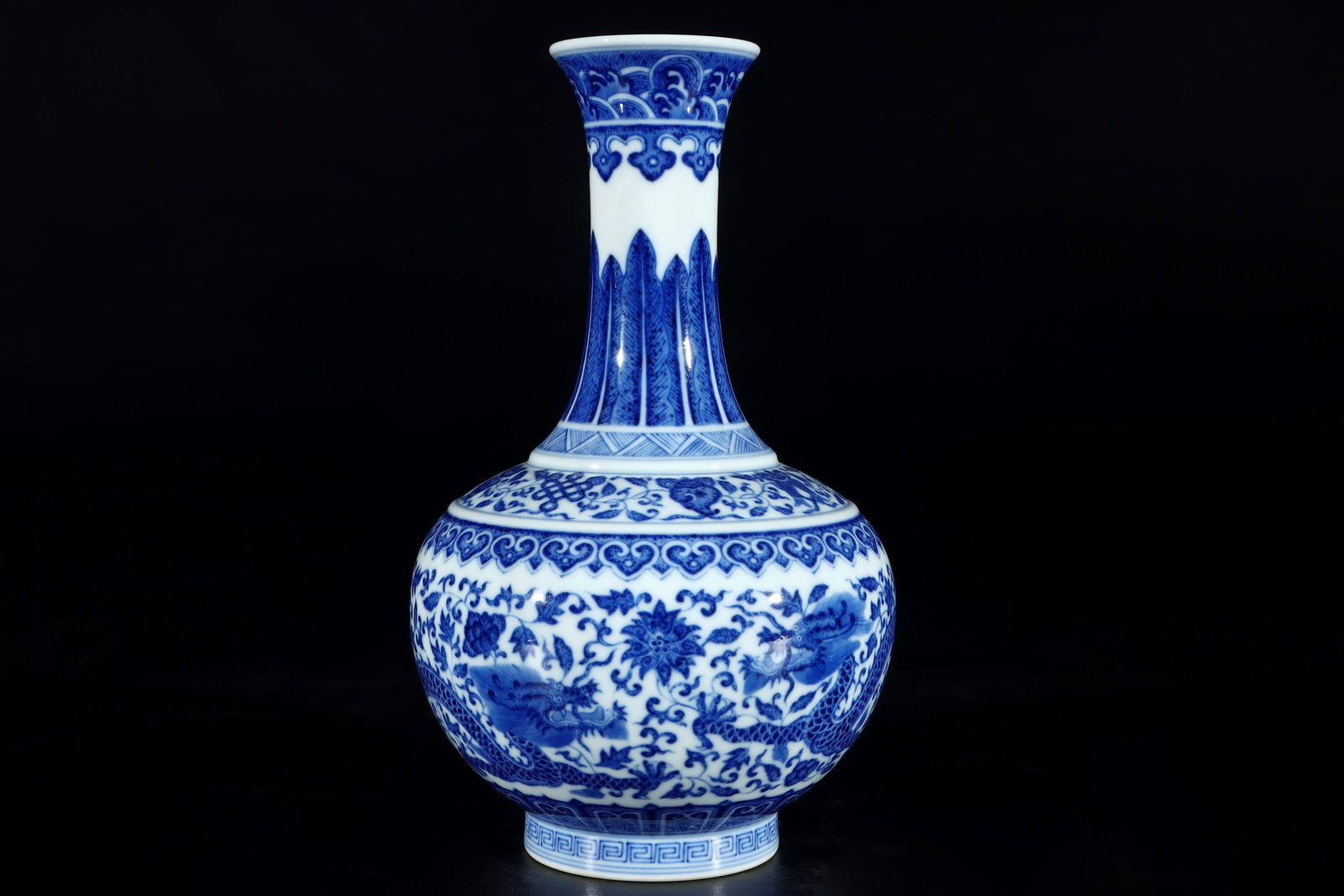 An Exquisite Blue and White Lotus and Dragon Pattern Vase: An Exquisite Blue and White Lotus and Dragon Pattern Vase,Qing Dynasty,China,Qianlong Six-character Mark,Size:8.3inx4.9in